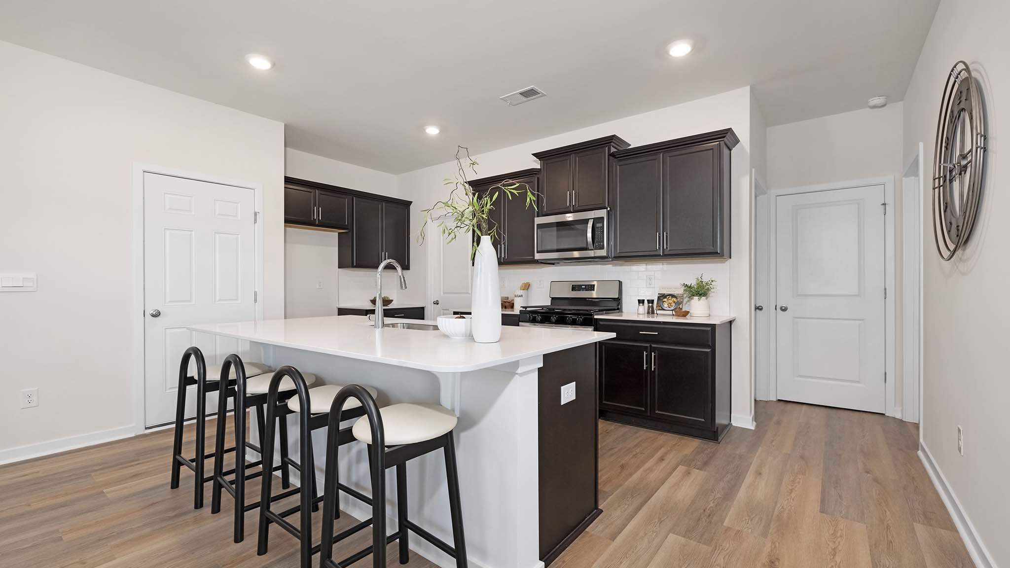 Kitchen and Island with stainless steel appliances