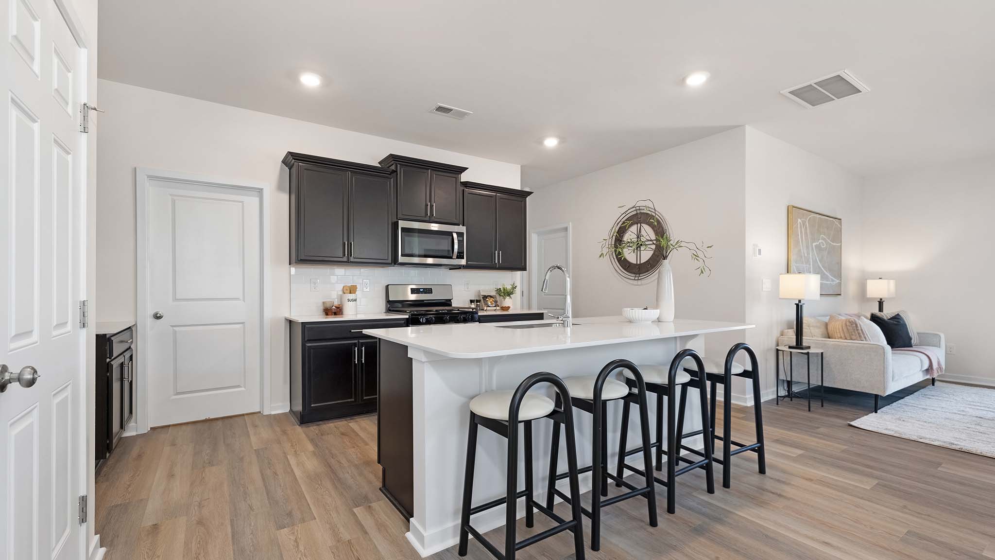 Kitchen and Island with stainless steel appliances