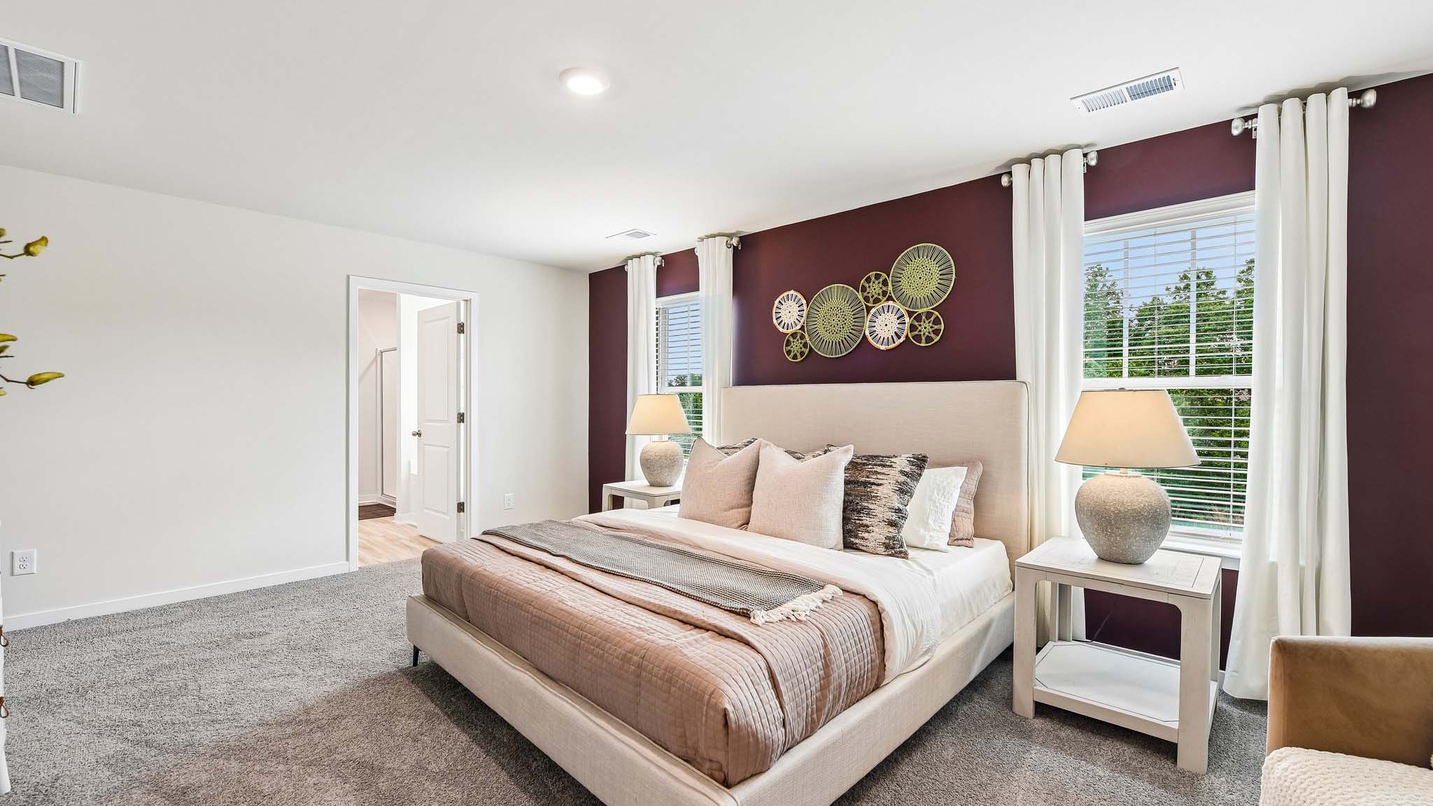 Primary carpeted bedroom
