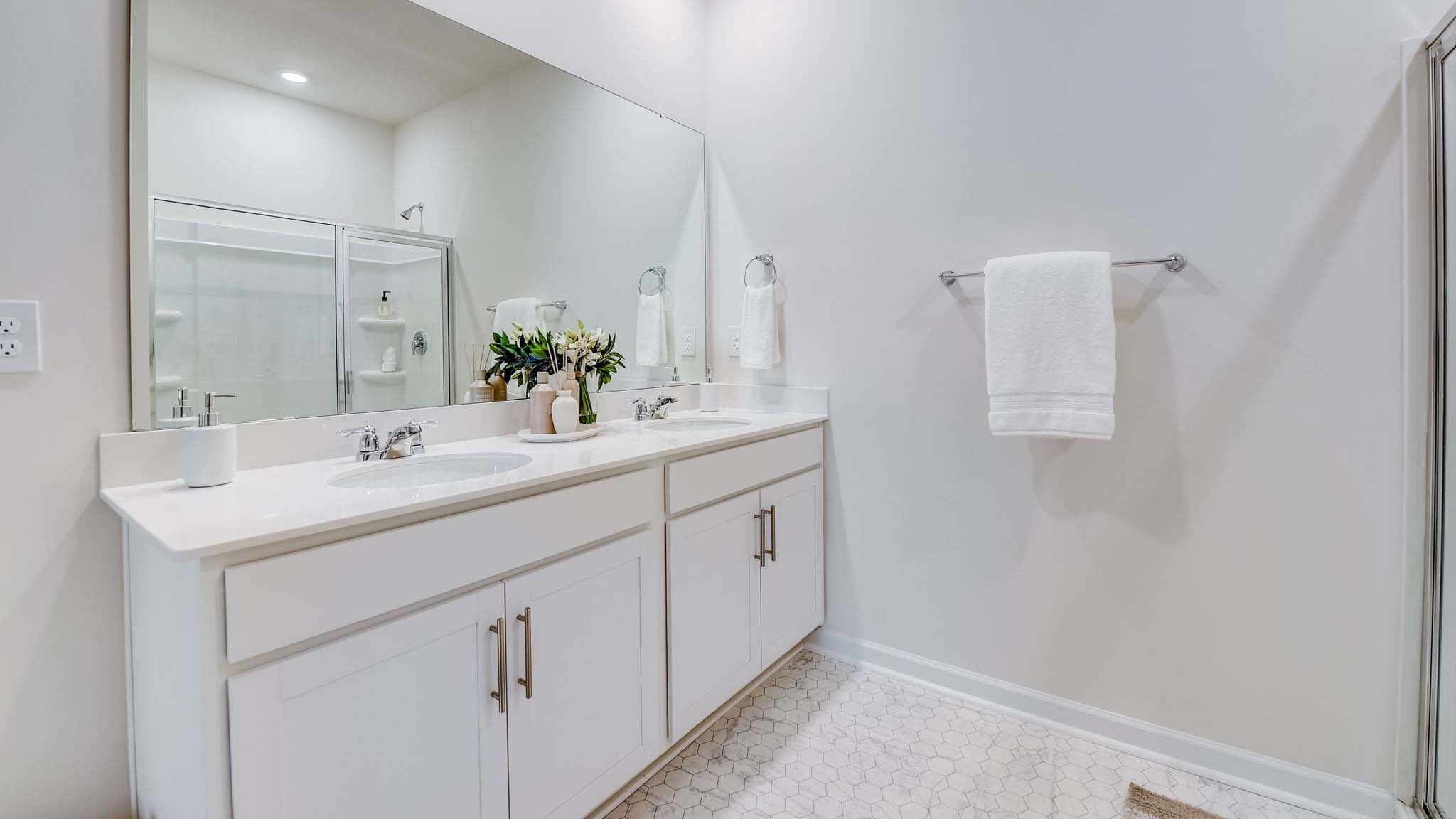 Bathroom with glass door standing shower