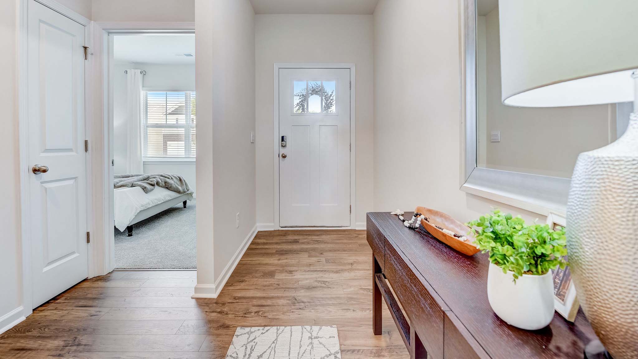 Welcoming foyer with wood floors, view of home interior