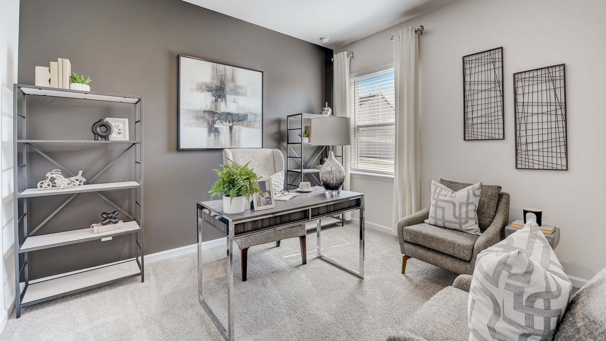 Carpeted bedroom with large window