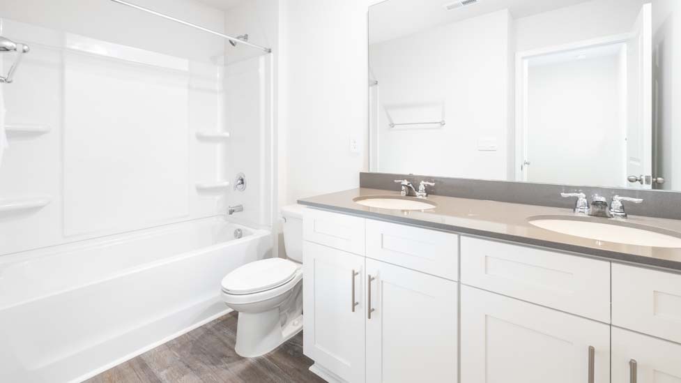 Bathroom with bathtub and shower combination