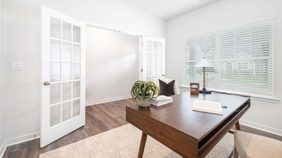 Office space with french doors and vinyl floors