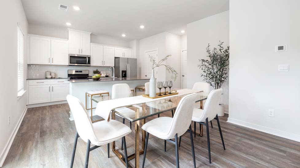 Dining room beside kitchen with sliding glass back door
