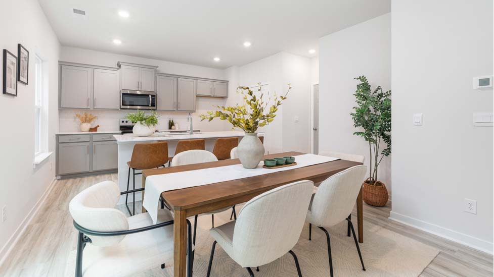 Dining room beside kitchen with sliding glass back door