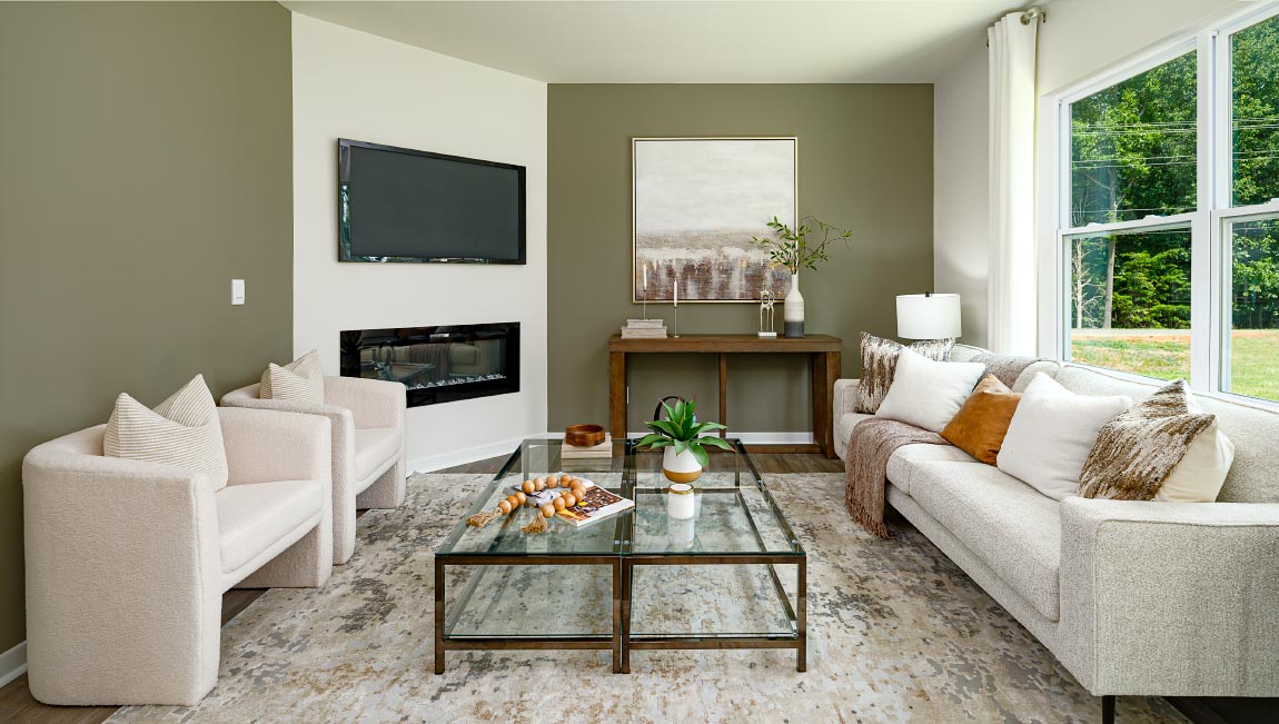 living room with vinyl flooring, electric fireplace and large window