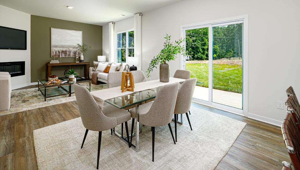 Dining room beside kitchen with sliding glass back door