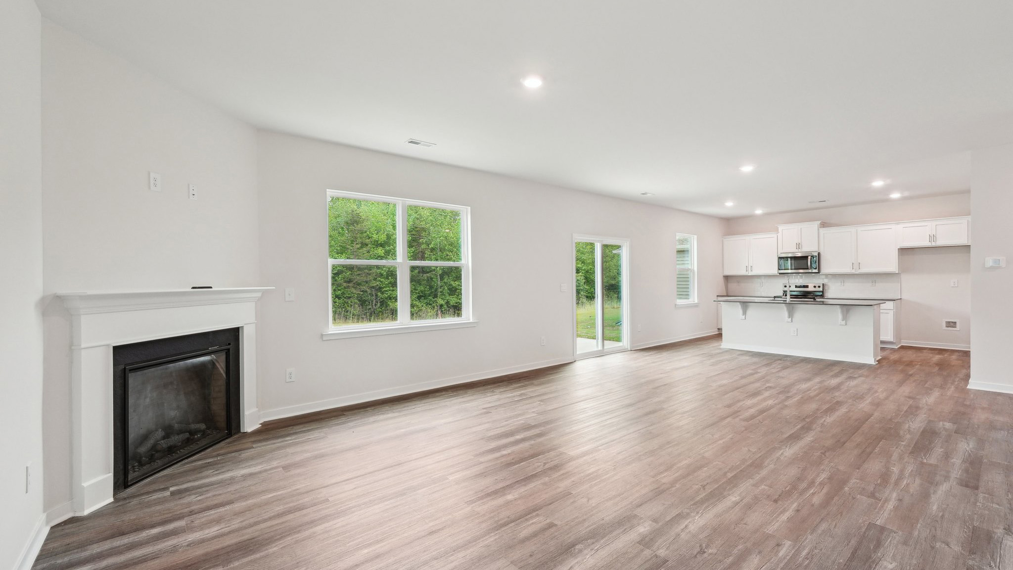 Living room space with windows