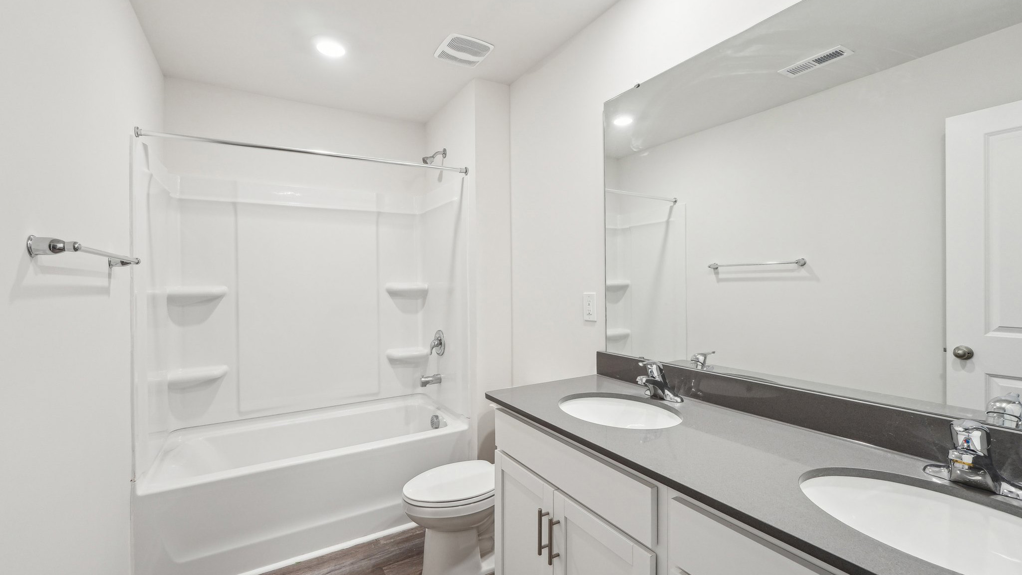 bathroom with bathtub shower combination