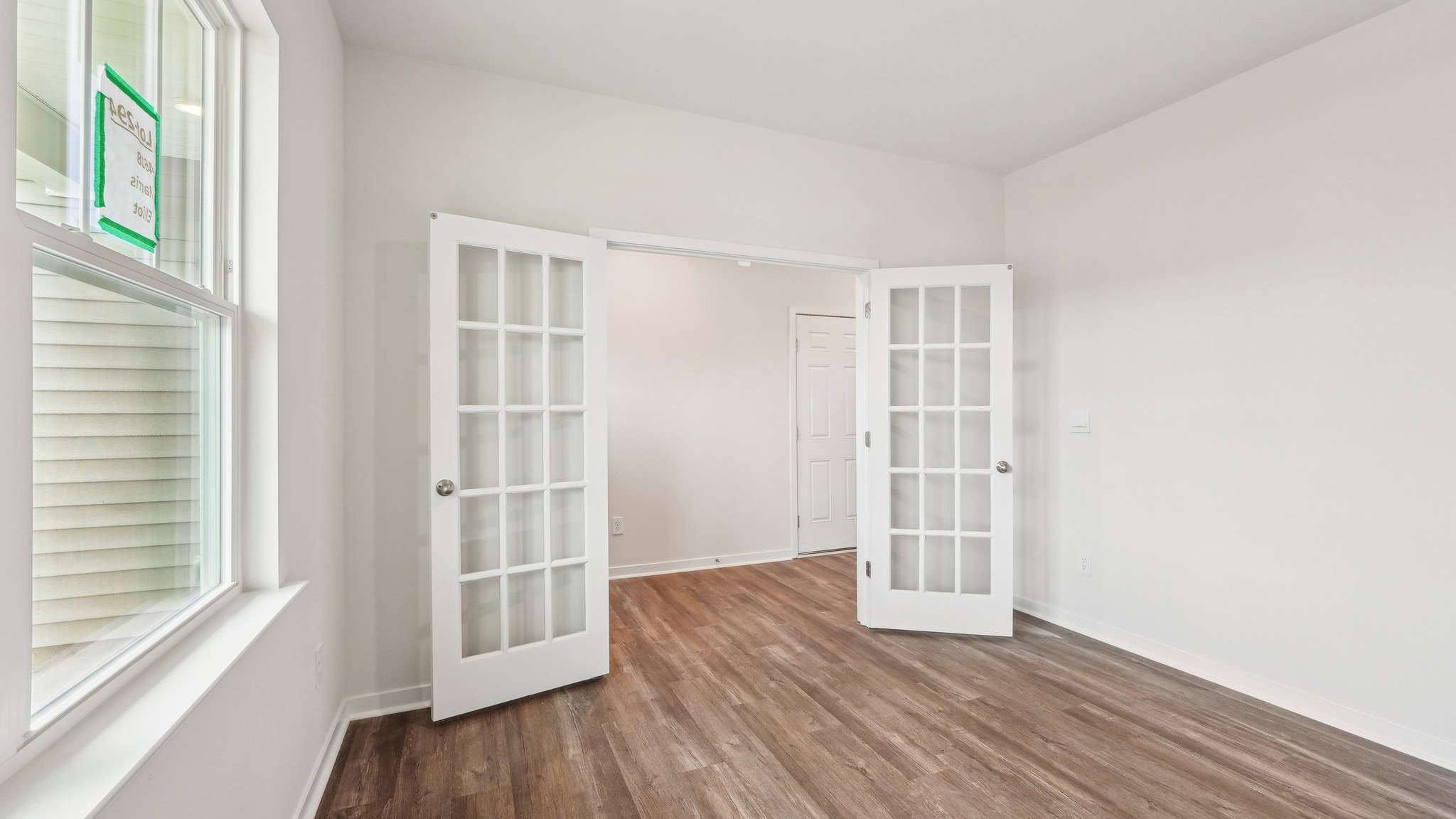 Flex space with large french doors