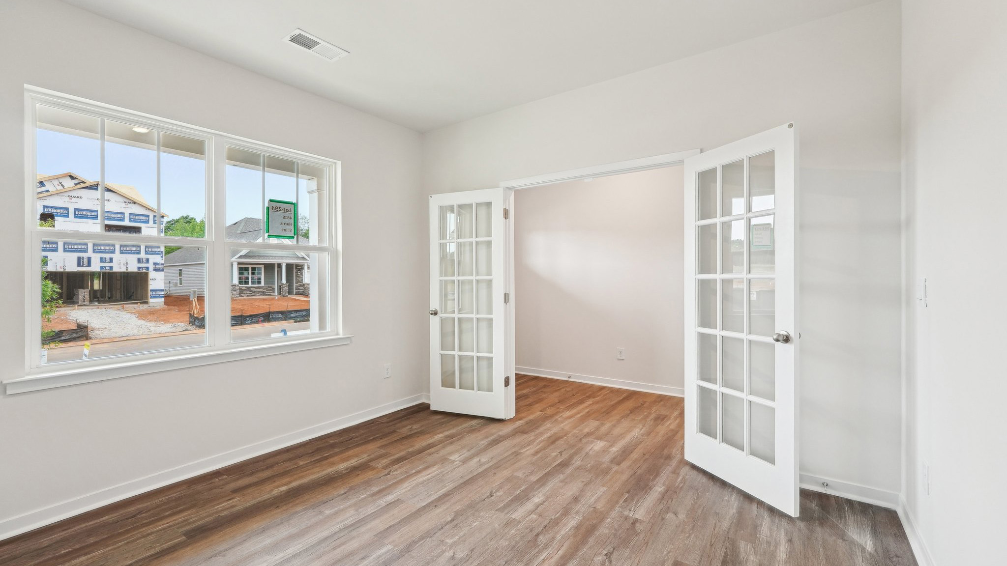 Flex space with large french doors