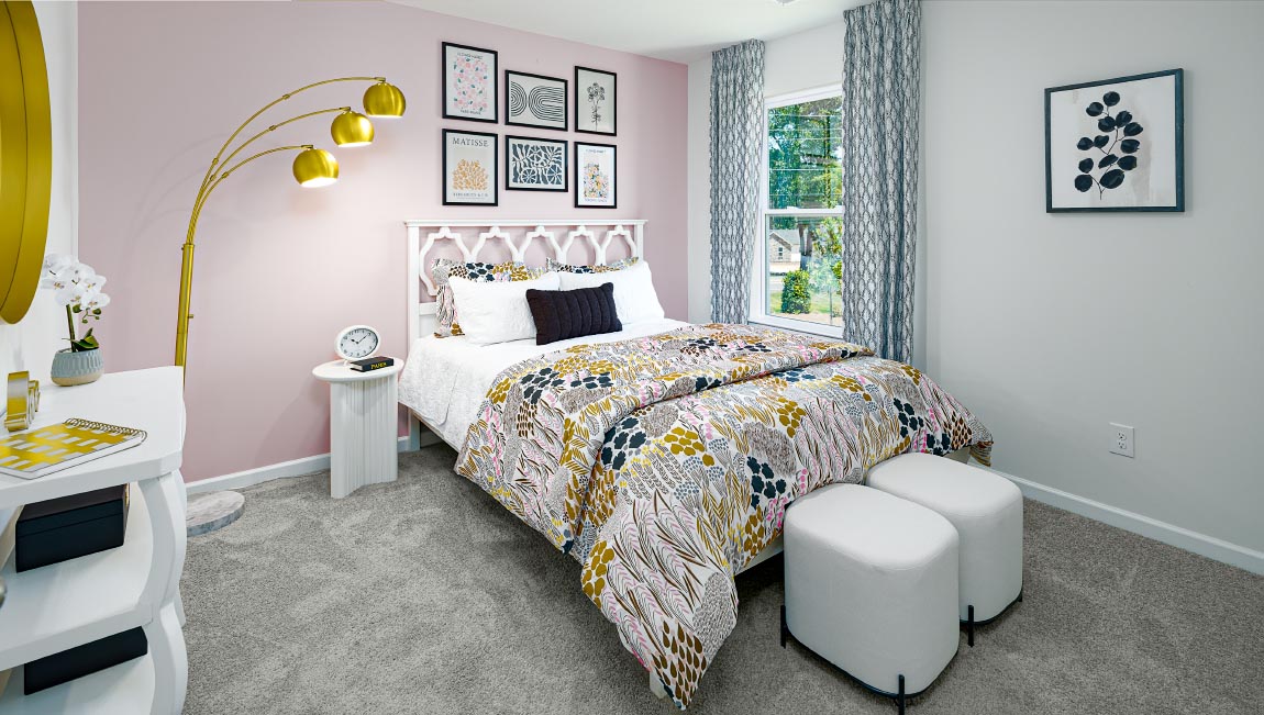 Carpeted bedroom with large window