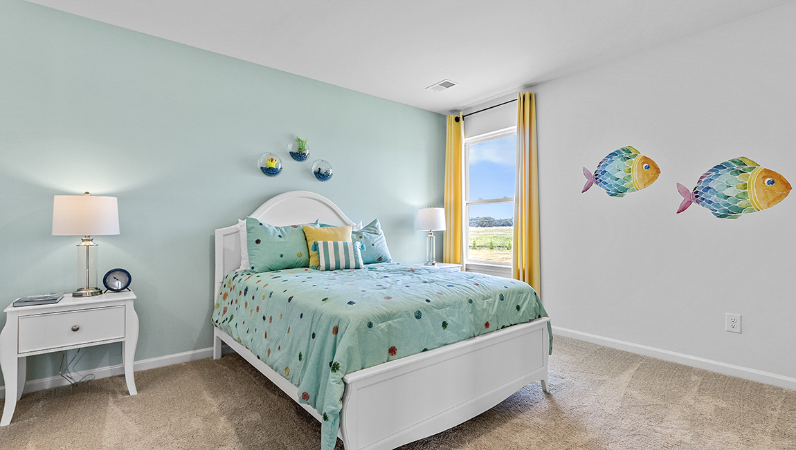 Carpeted bedroom with large window