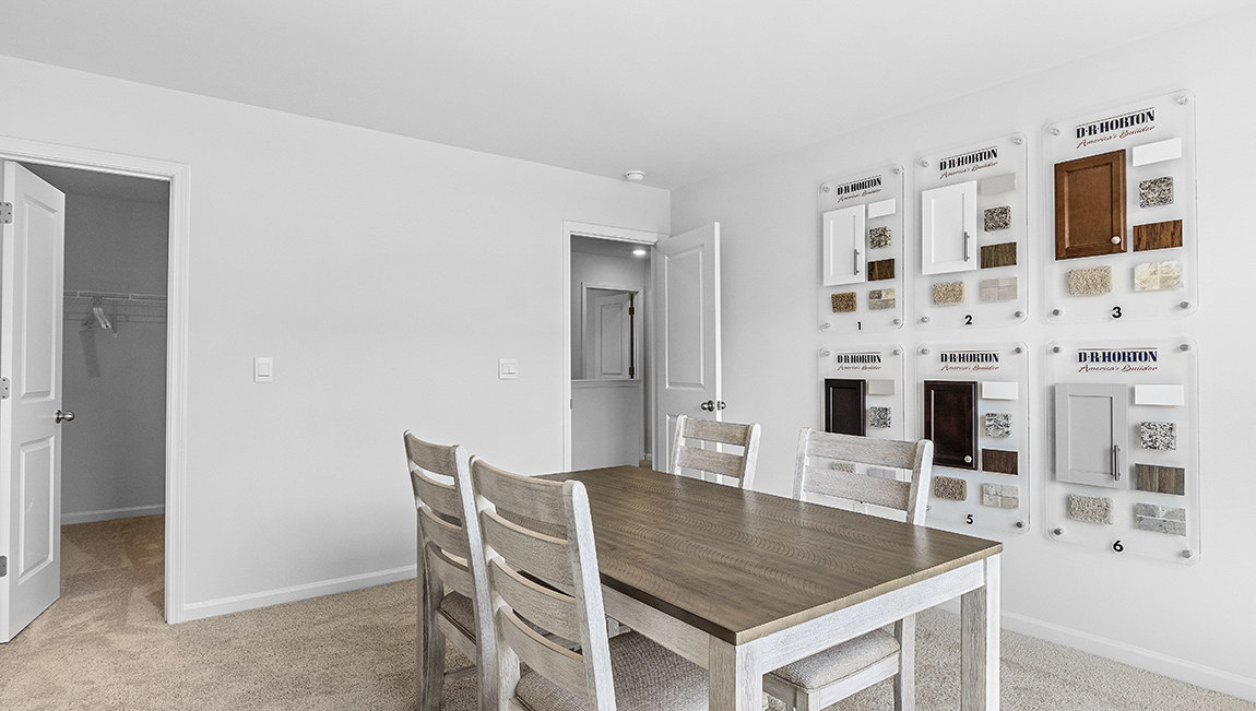 Carpeted bedroom with large window