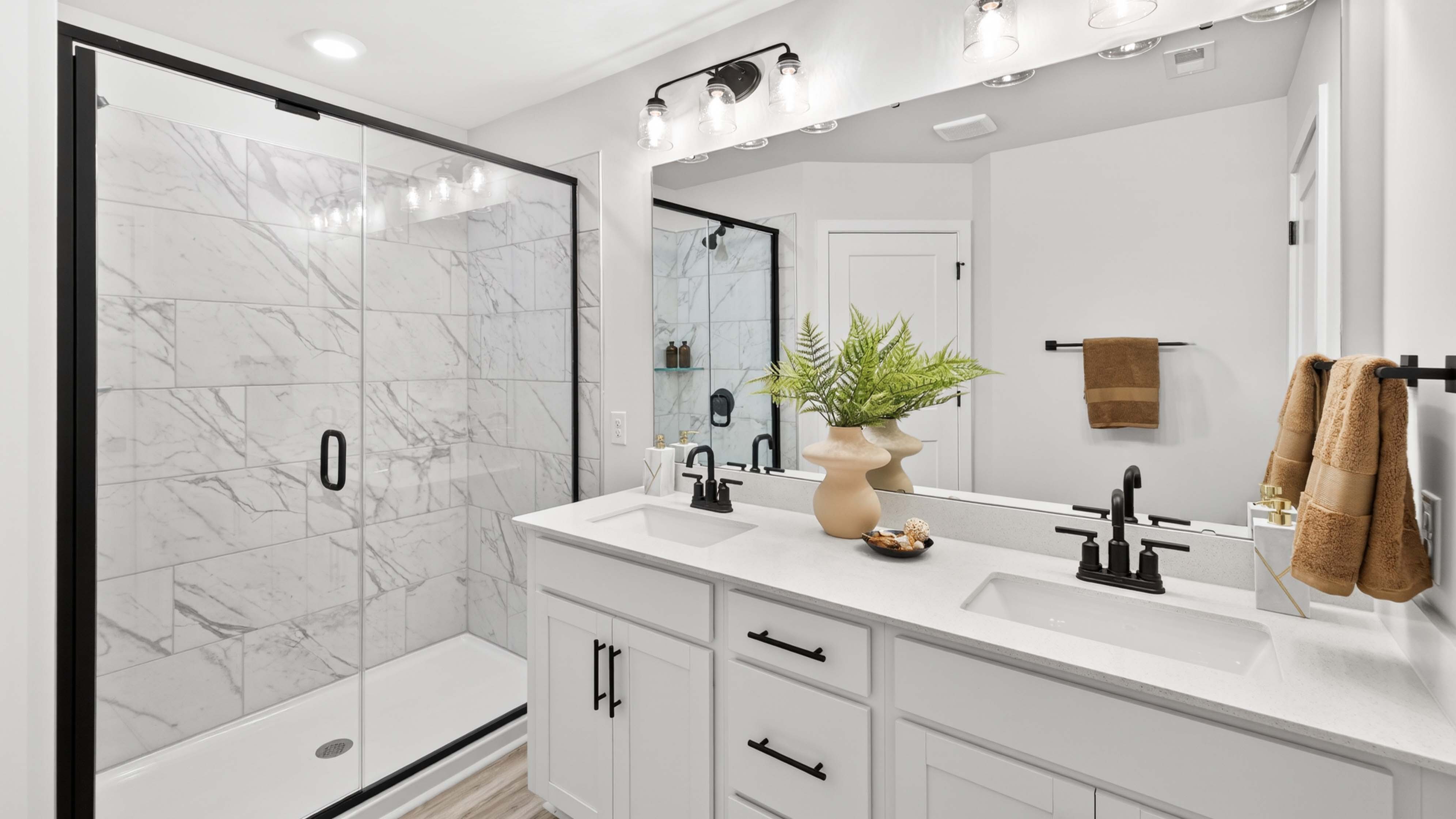 Bathroom with standing glass shower