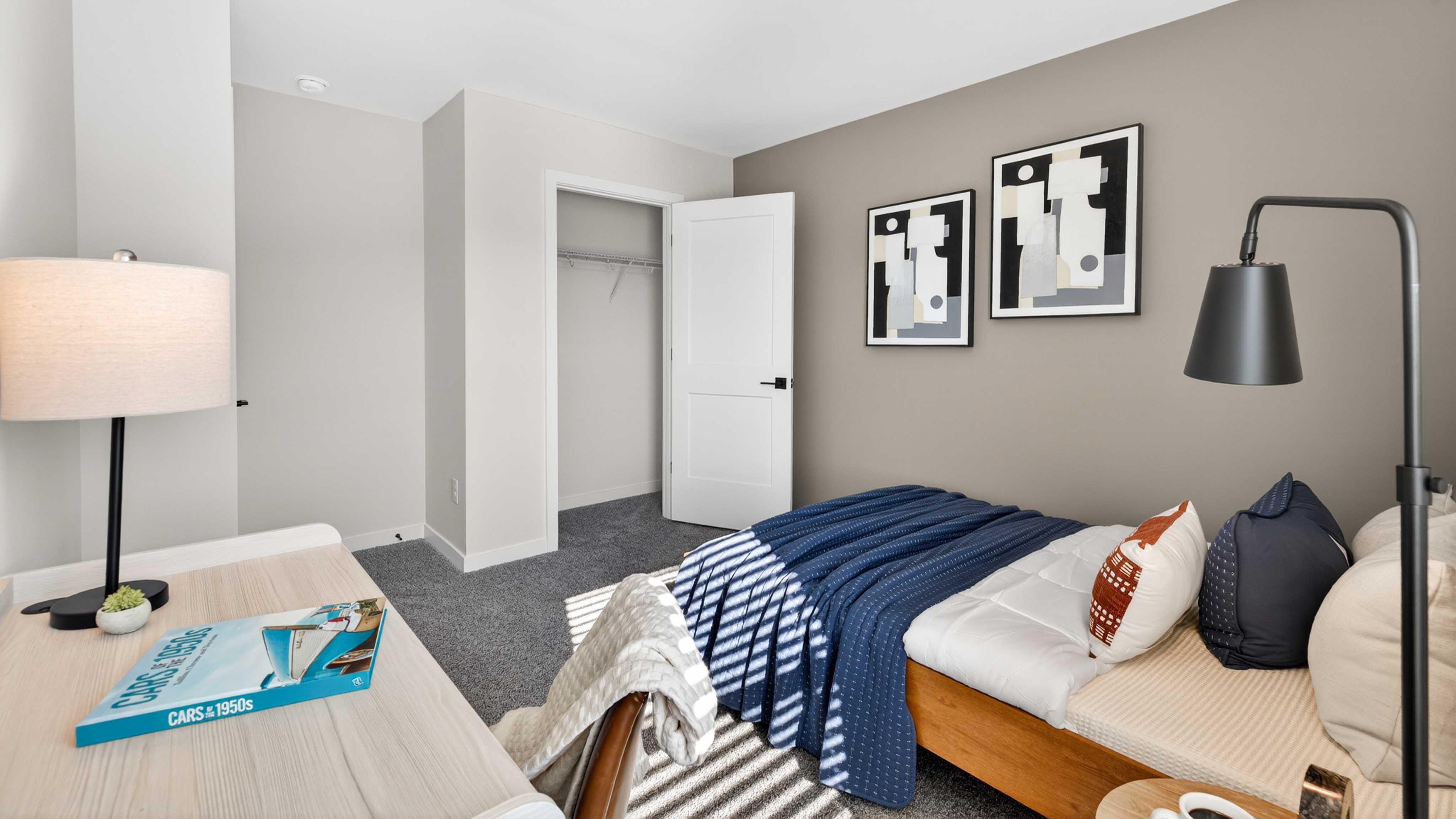 Carpeted bedroom with window