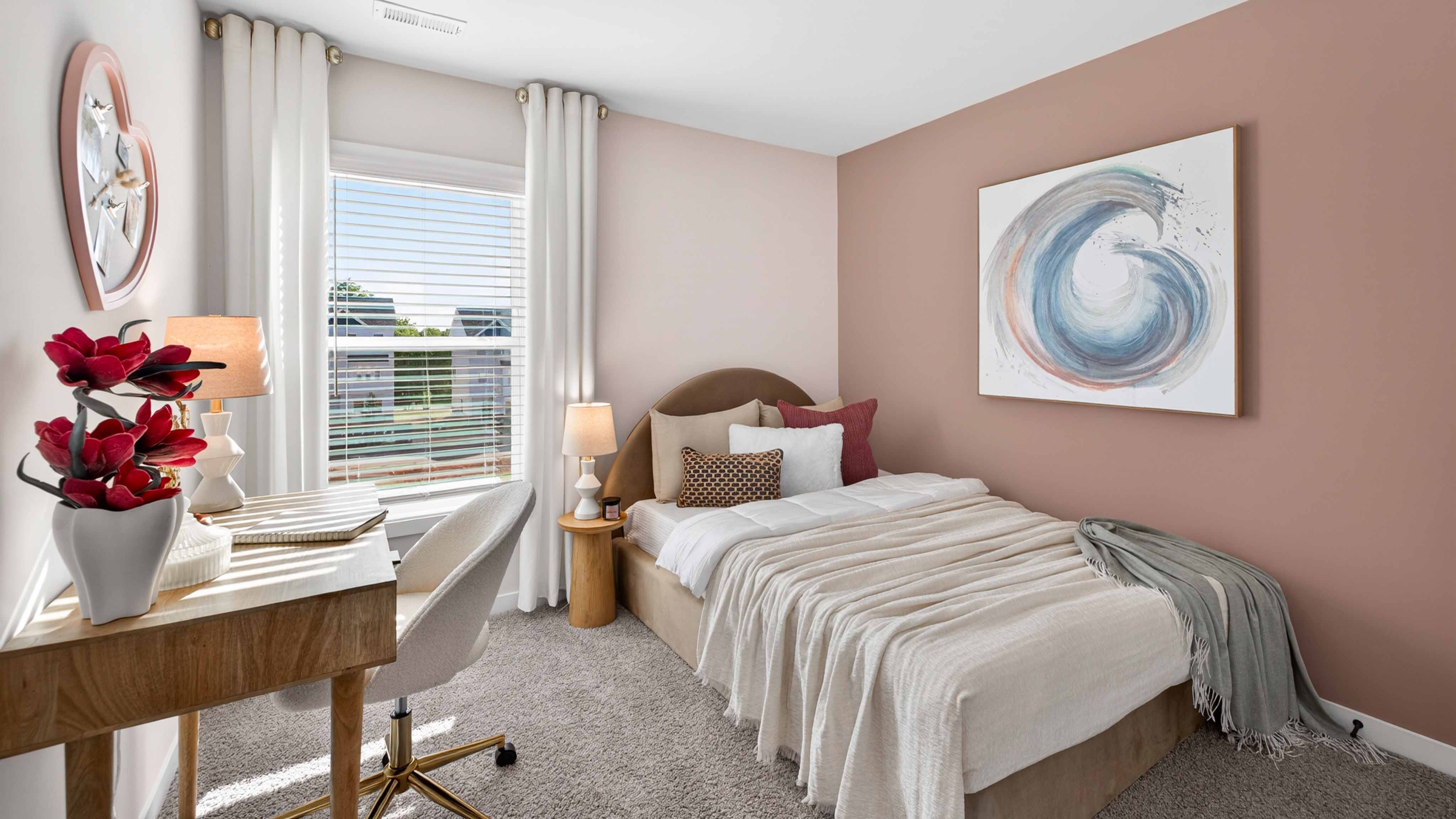 Carpeted bedroom with window