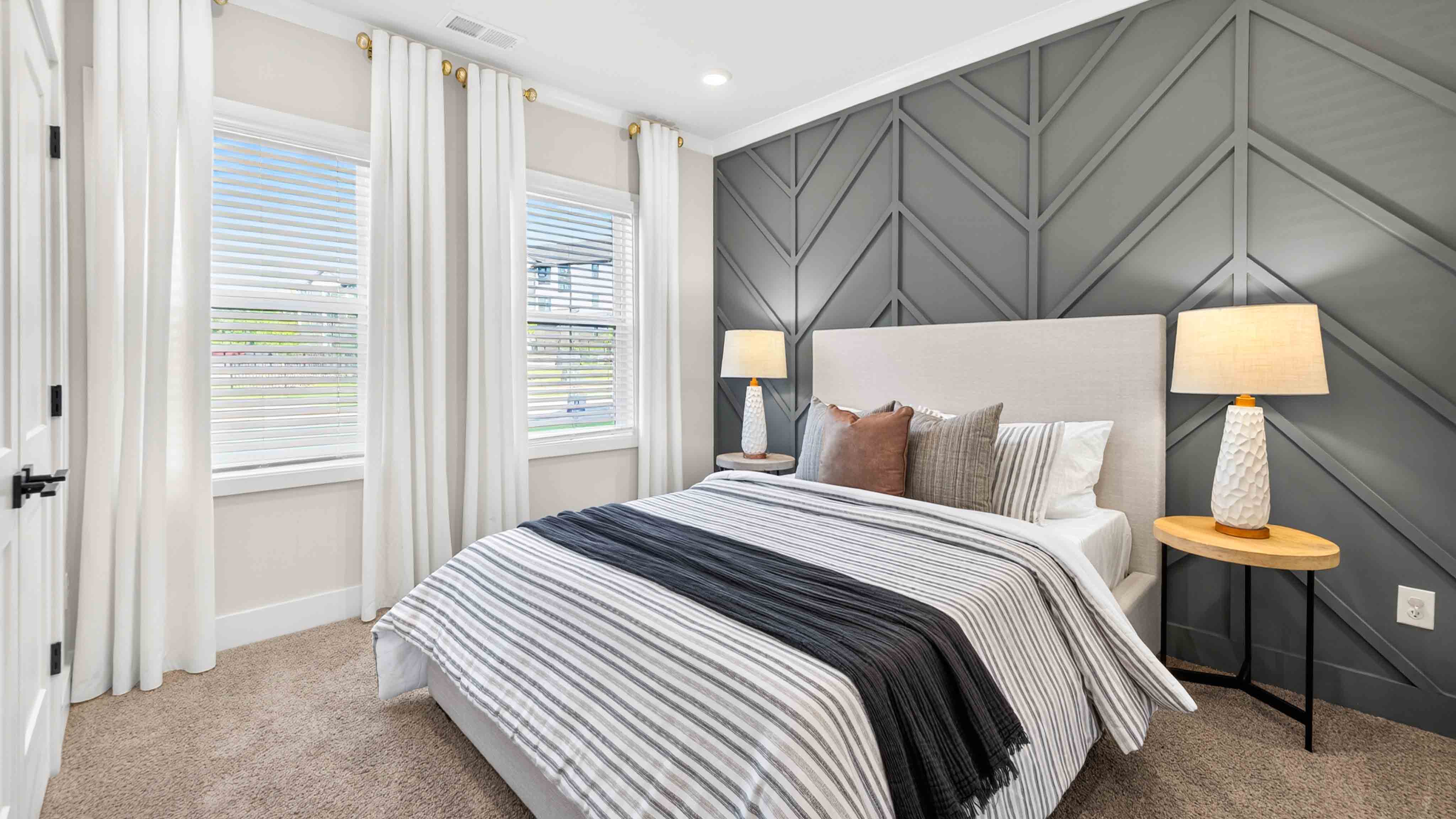 Carpeted bedroom with window