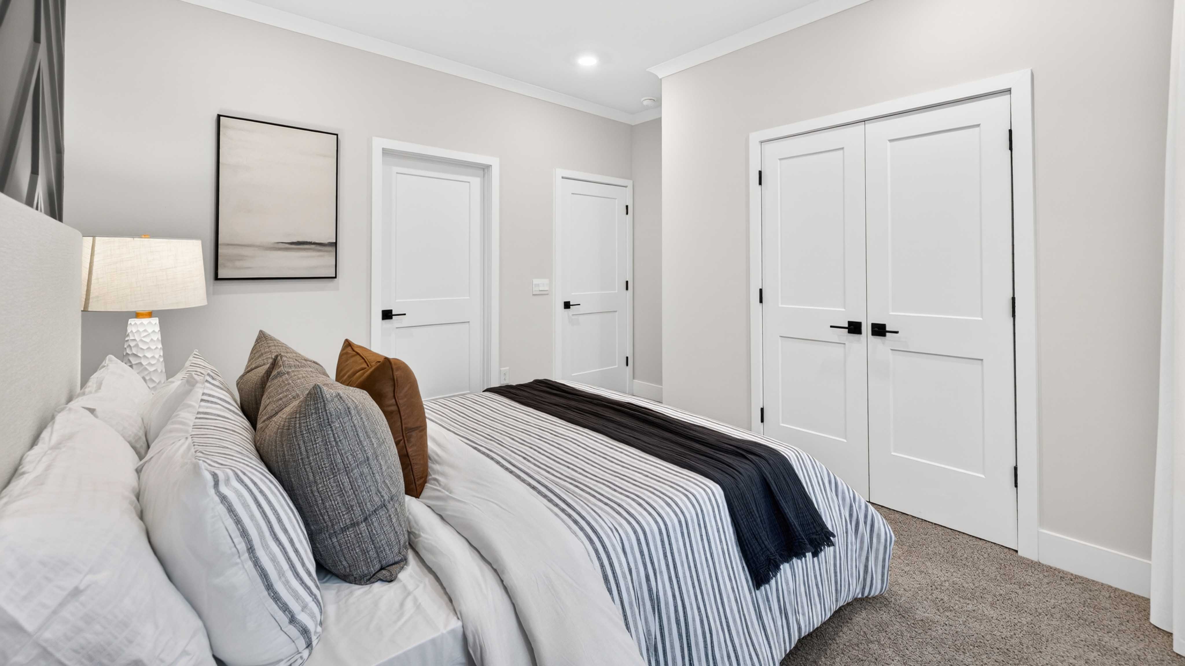 Carpeted bedroom with window