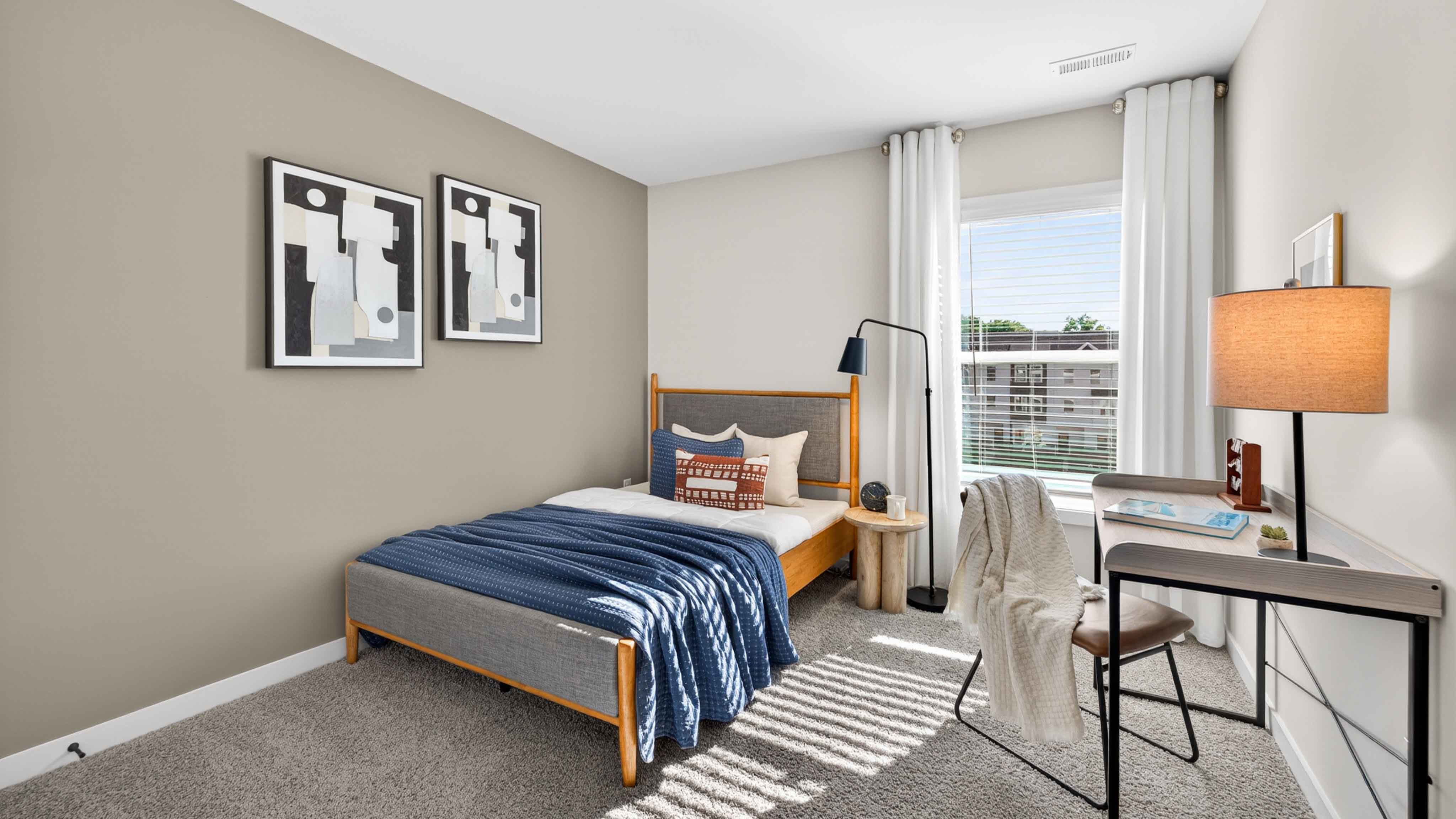 Carpeted bedroom with window