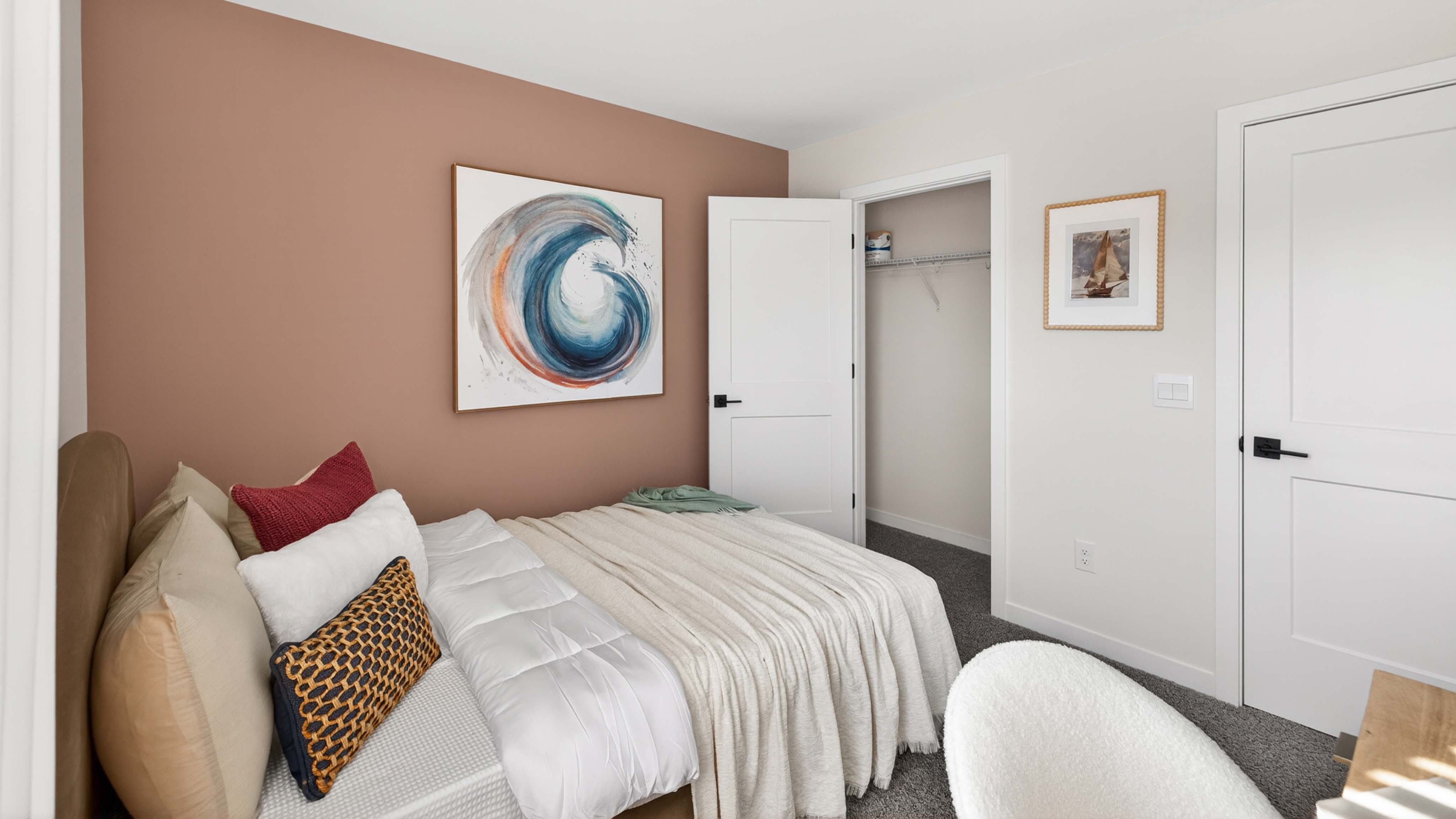 Carpeted bedroom with window