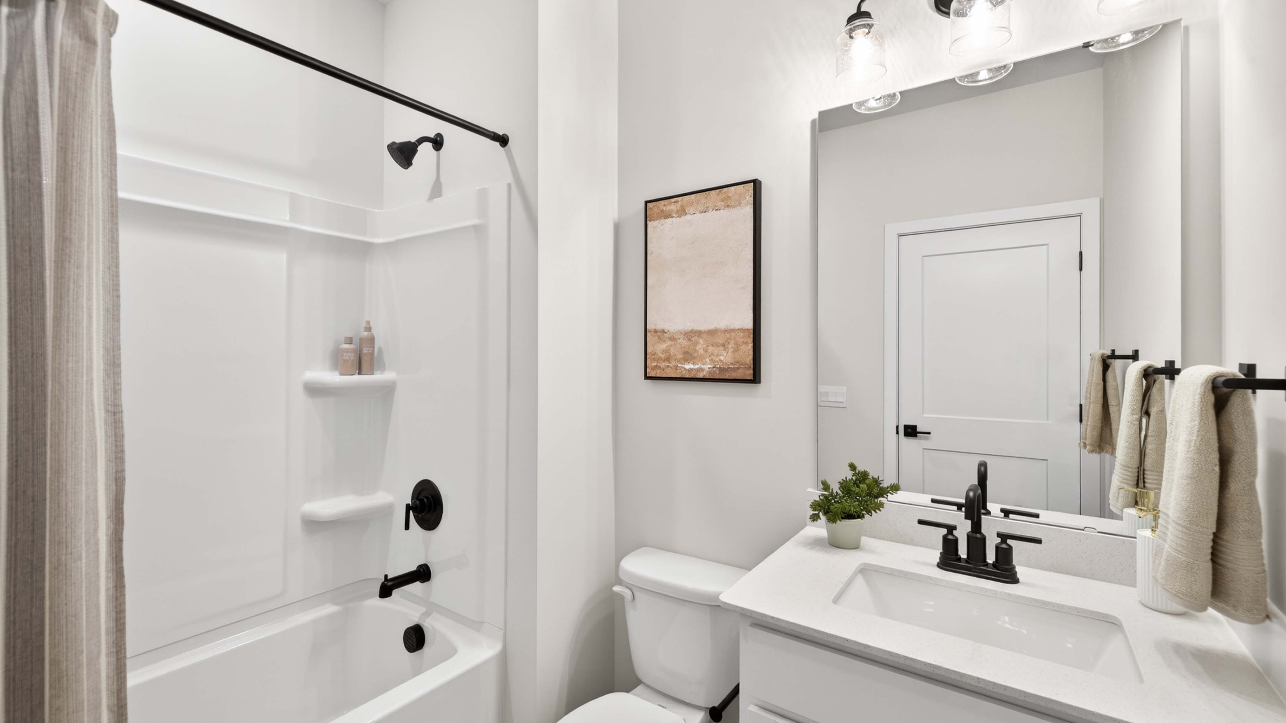 bathroom with tub shower