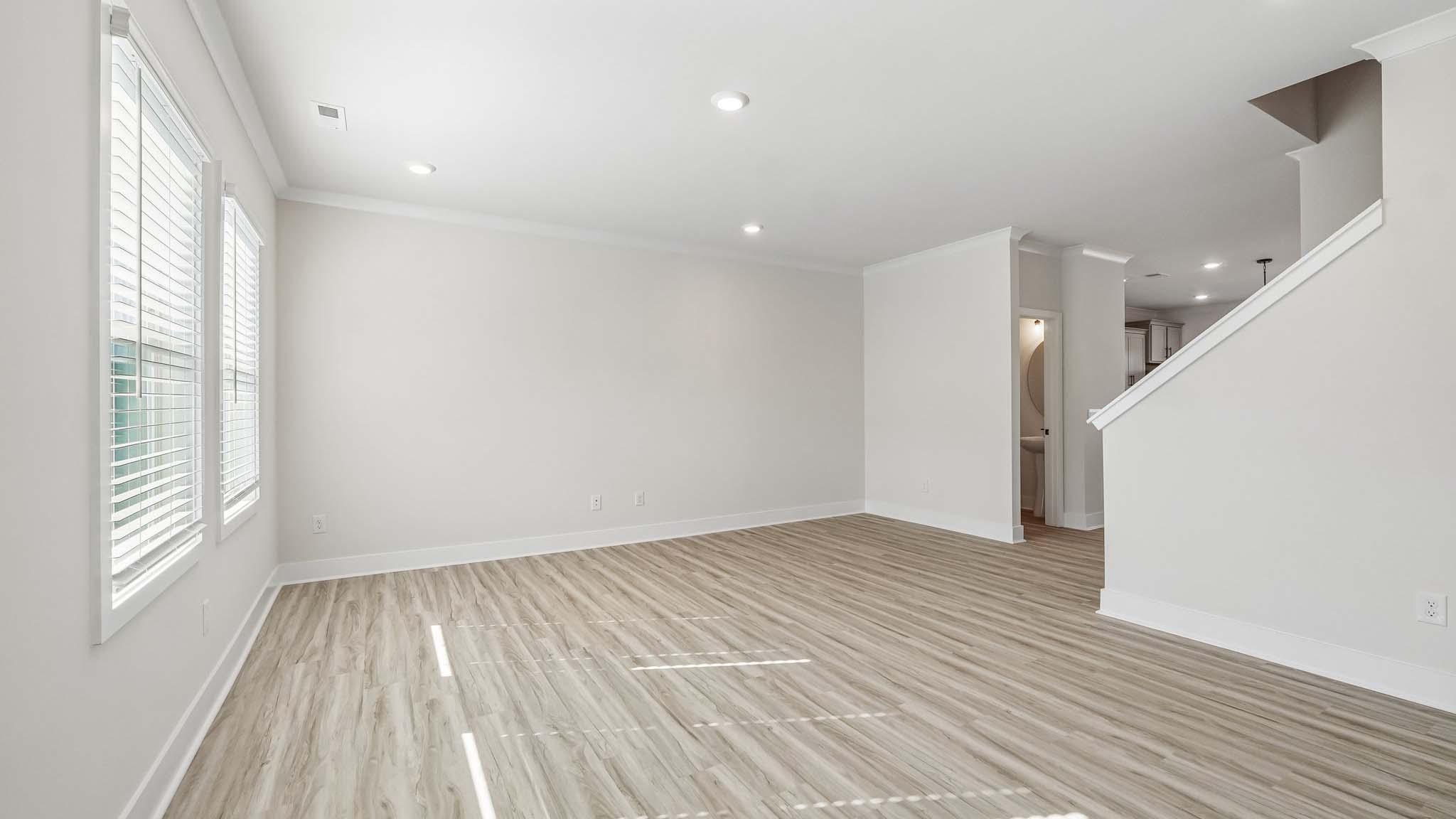 Living room area with windows