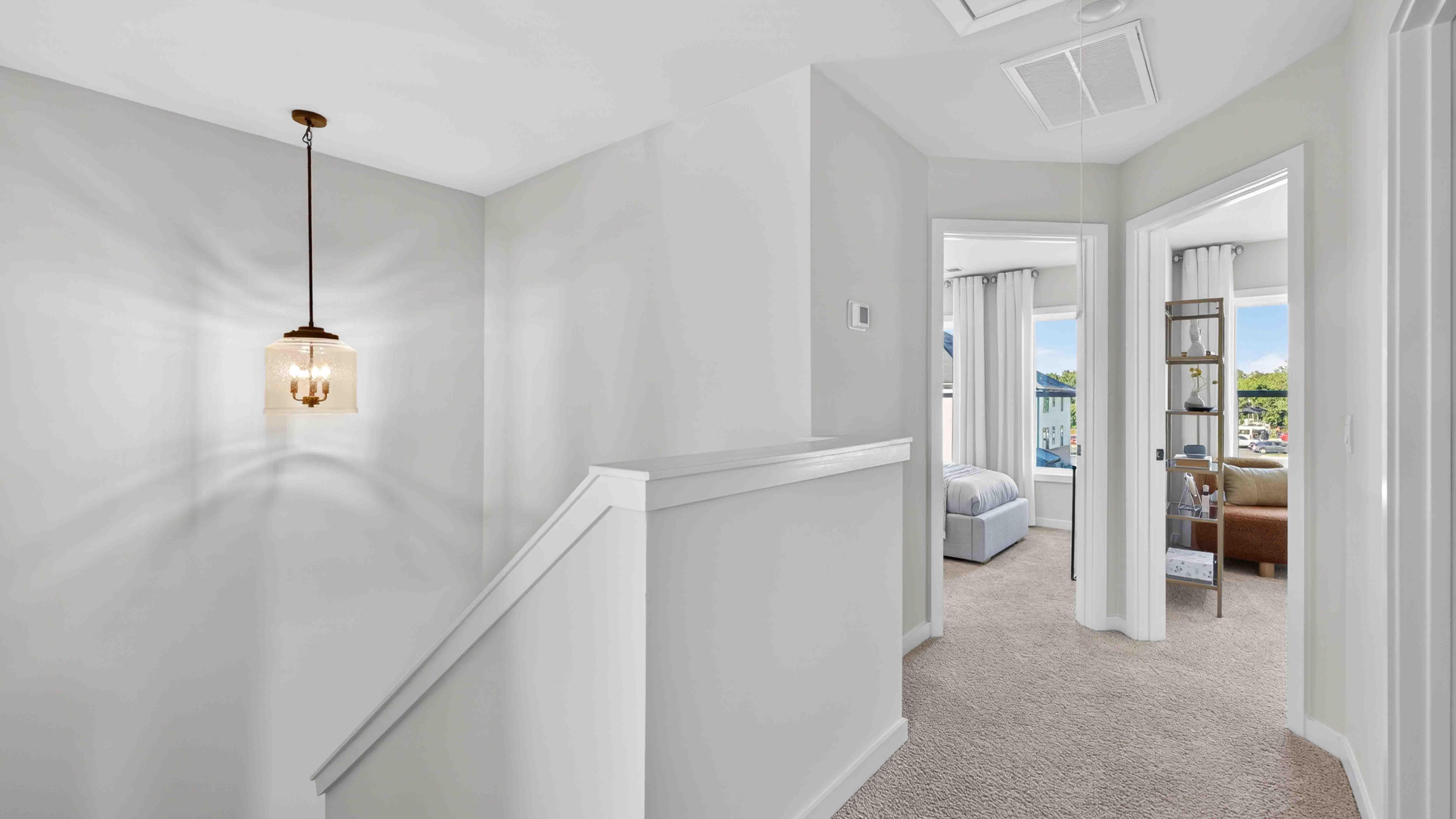 Upstairs landing area with view of stairs