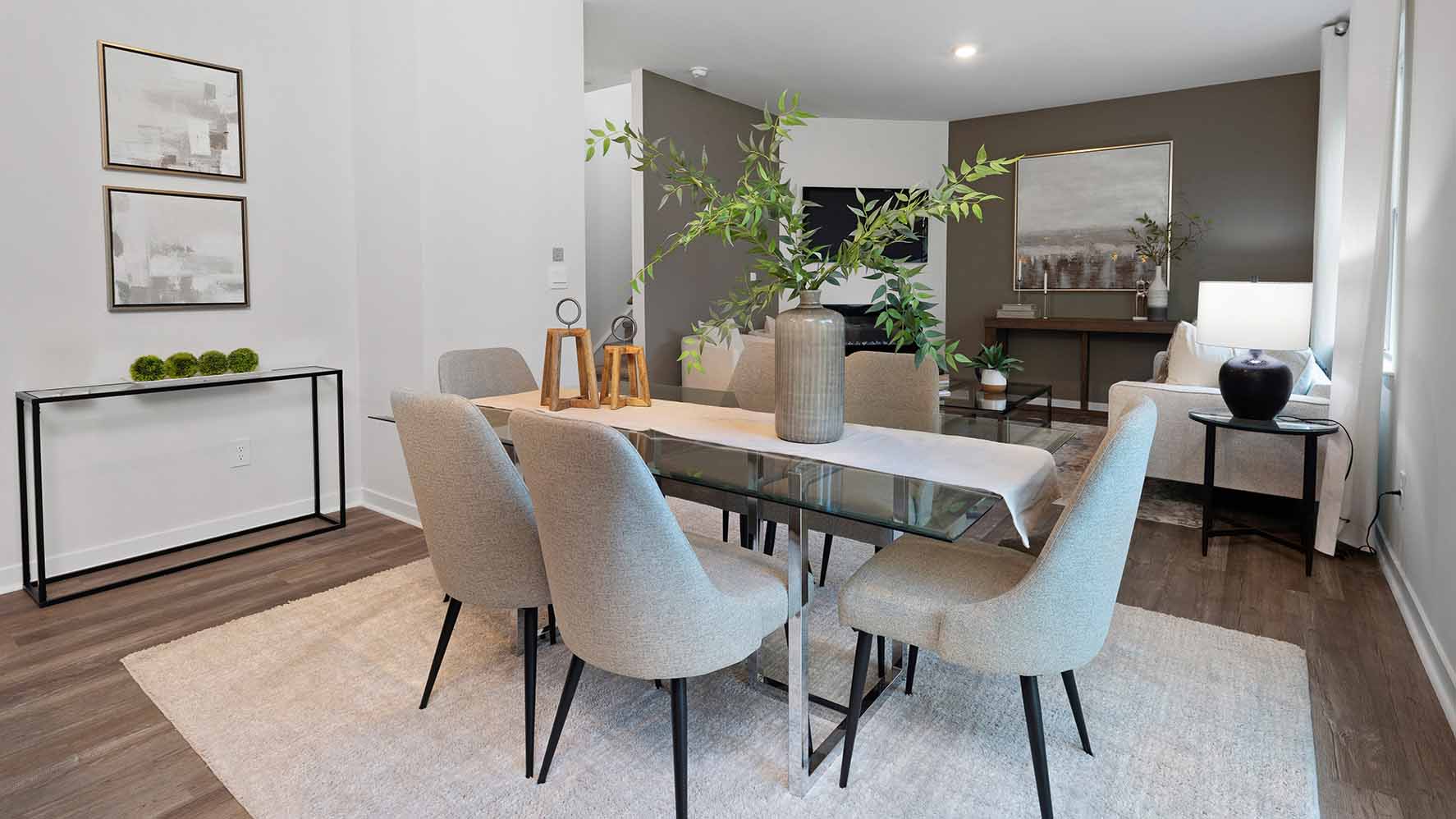 Dining room beside living room with sliding glass back door