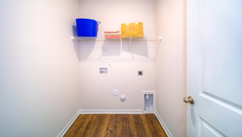 Laundry room with rack