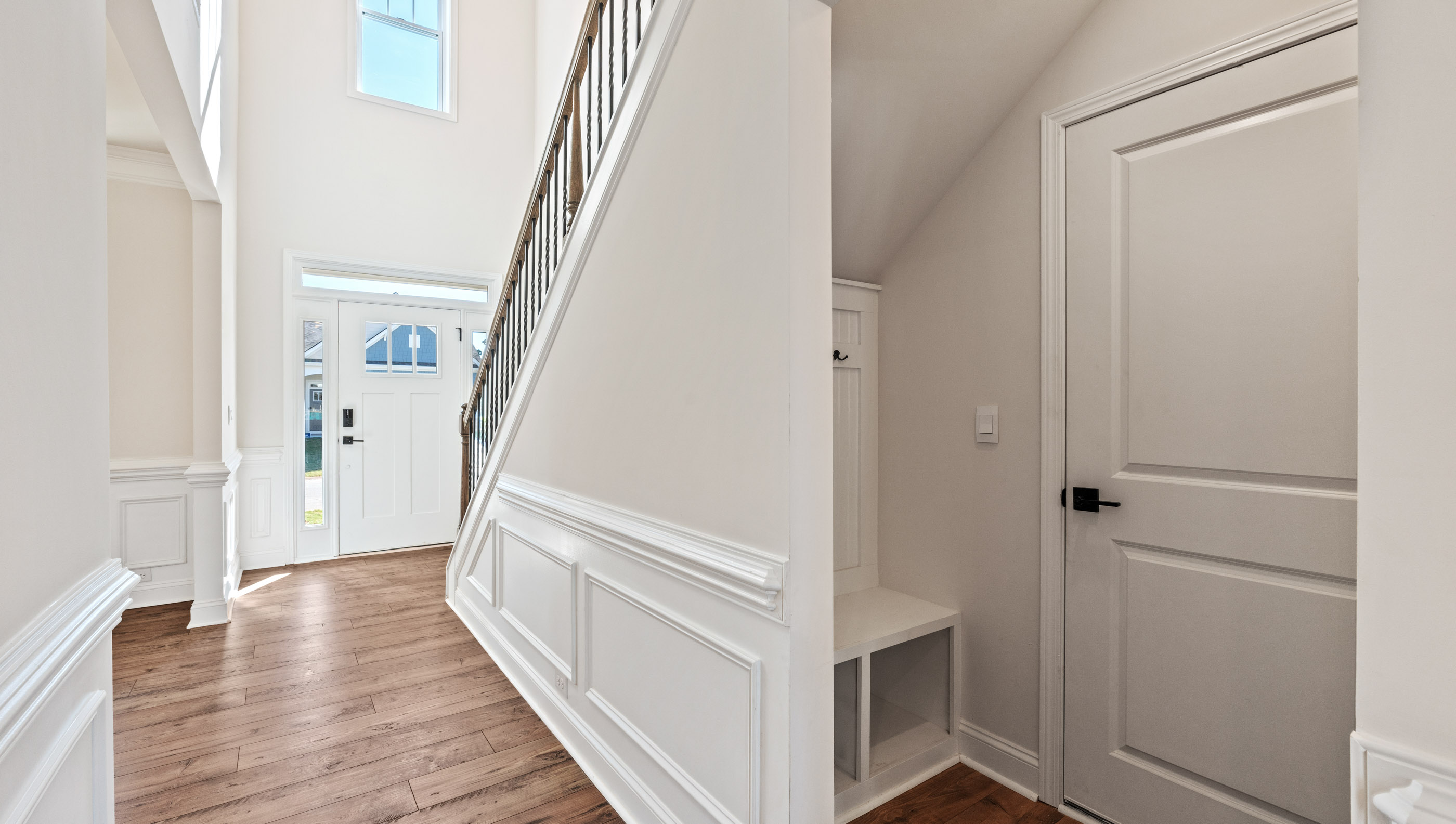 Welcoming foyer, view of drop zone and front door