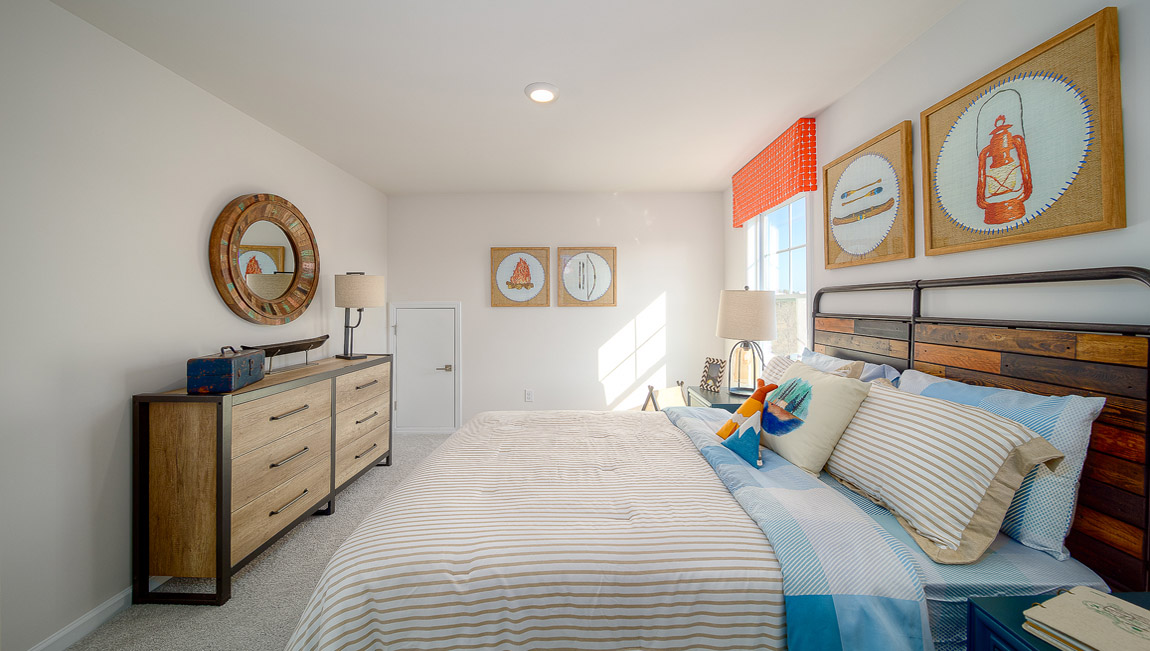 Carpeted bedroom with  small window