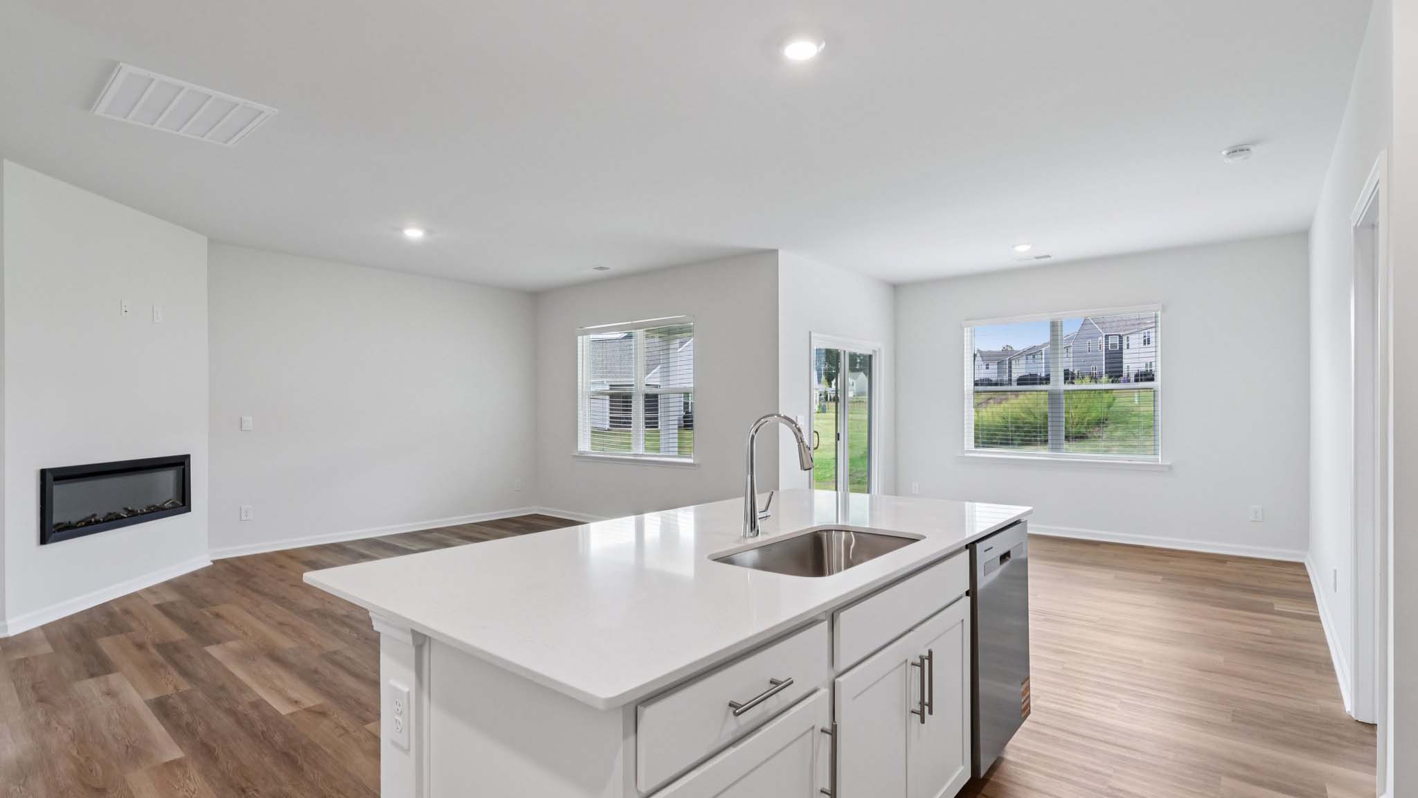 kitchen and island with stainless steel appliances