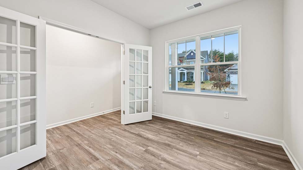 Dining room beside kitchen with sliding glass back door