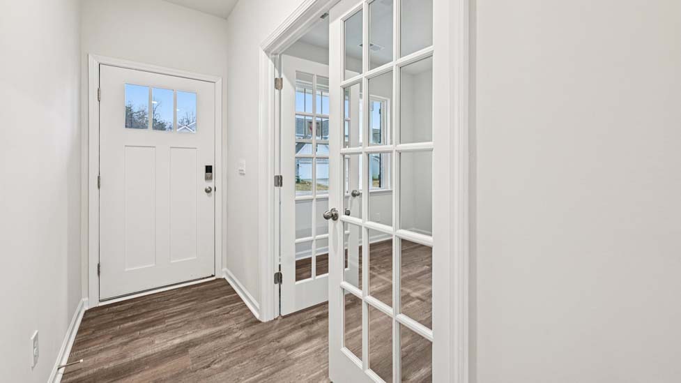Dining room beside kitchen with sliding glass back door