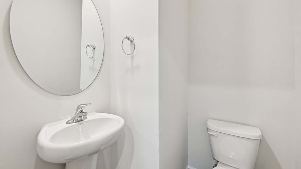 Powder bathroom with toilet and sink