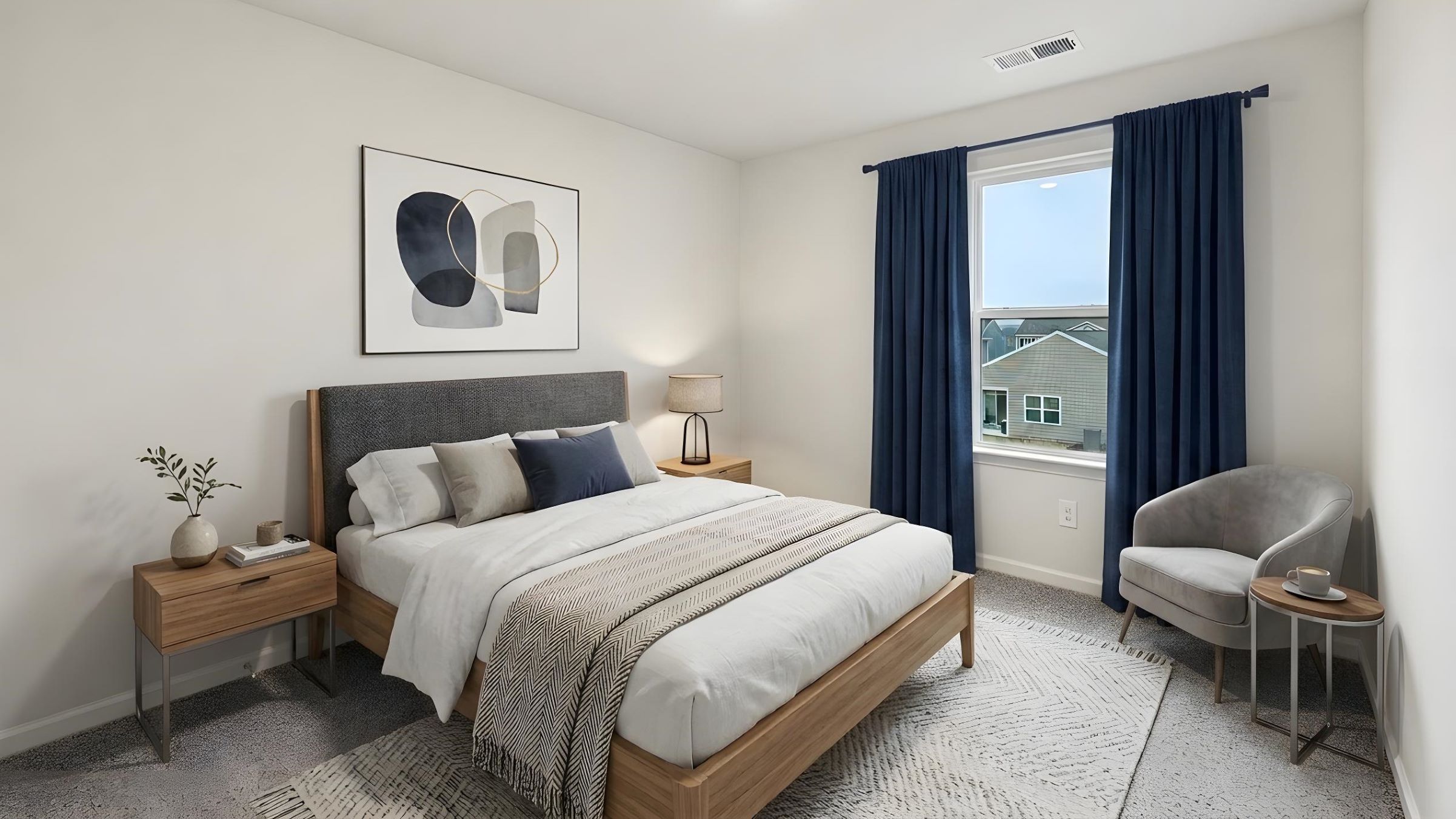 Carpeted bedroom with large window