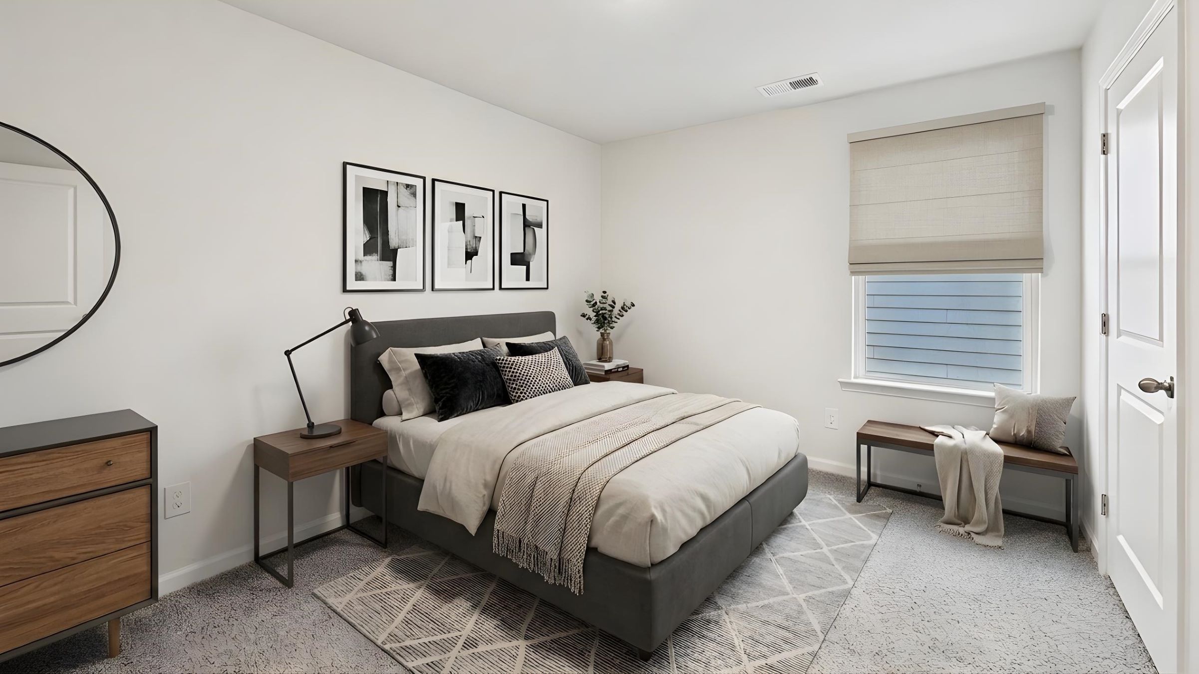 Carpeted bedroom with large window