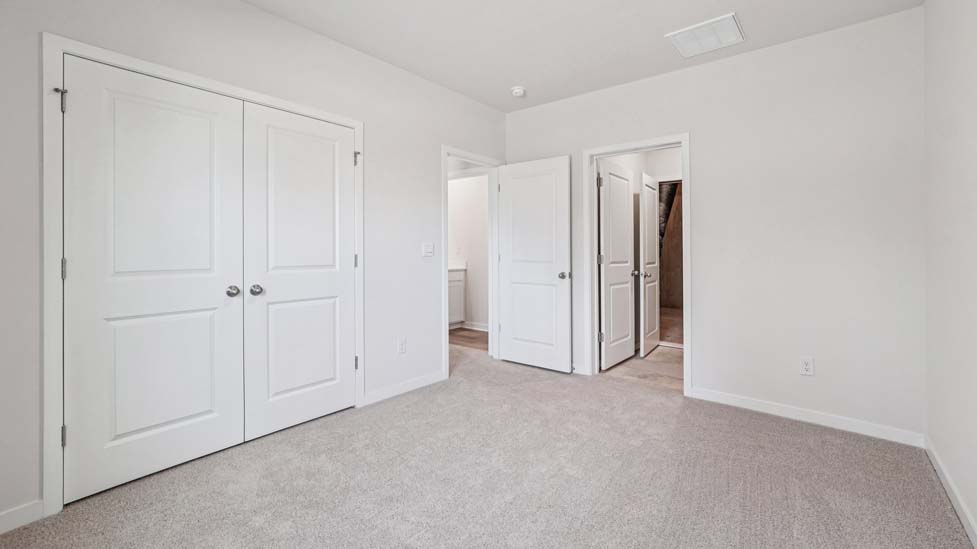 carpeted walk in closet