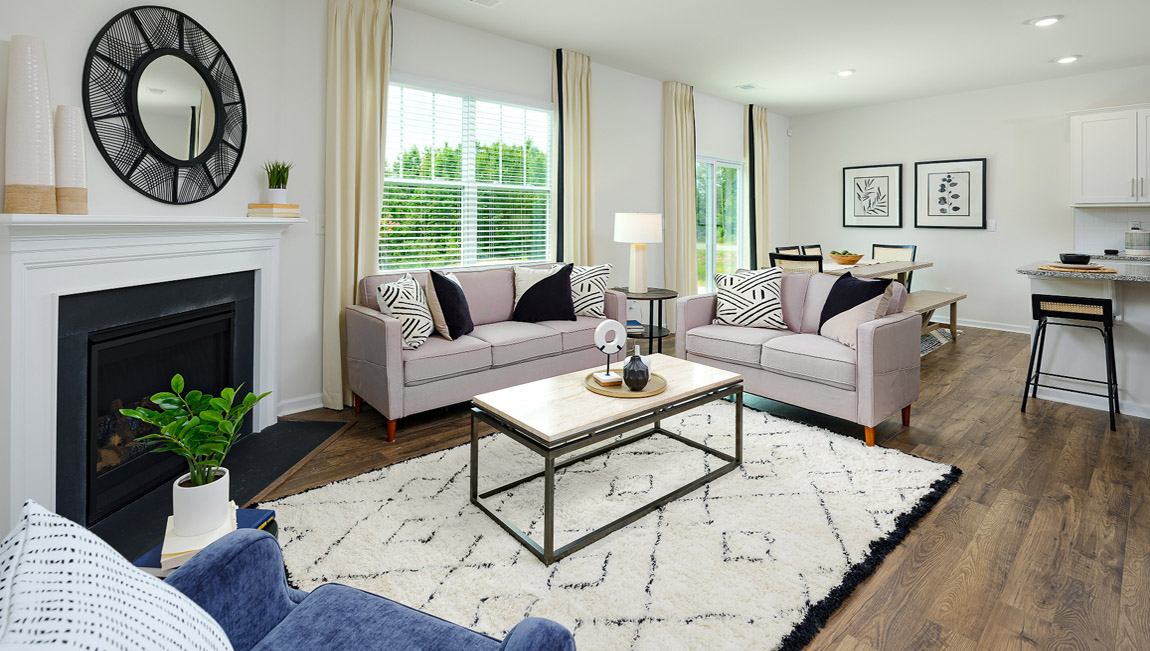 Open living area with fireplace and windows