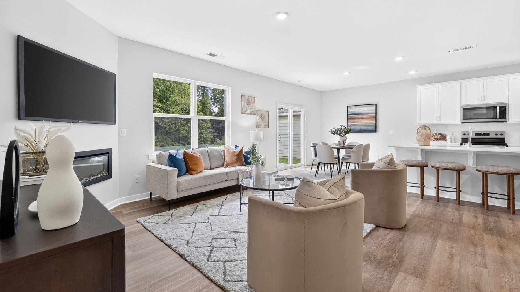 Open living area with fireplace and windows