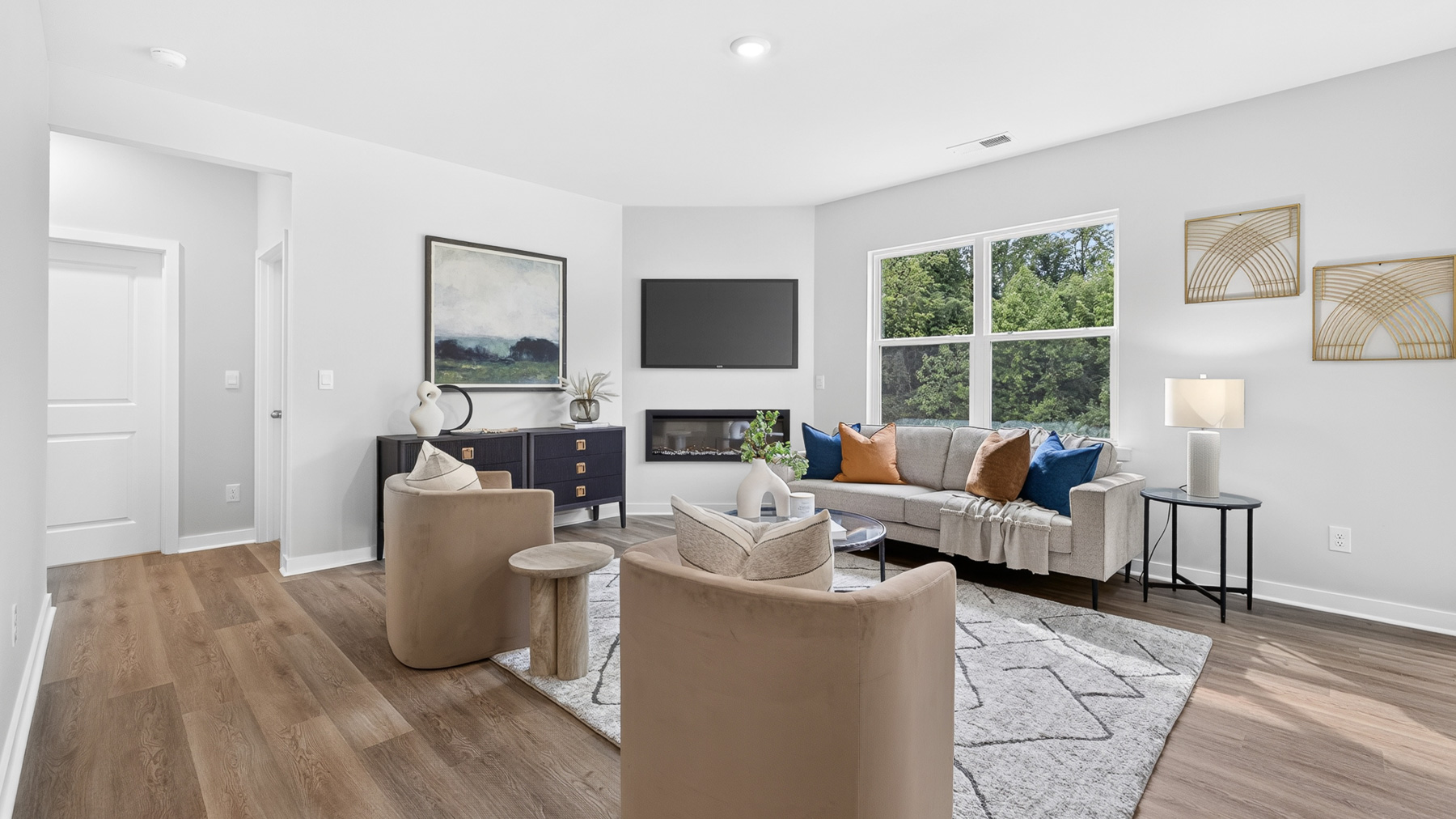 Open living area with fireplace and windows