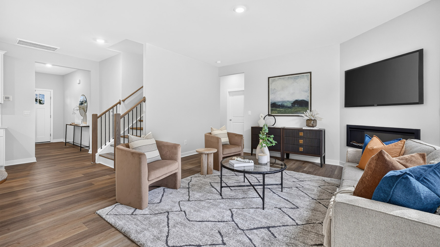 Open living area with fireplace and windows