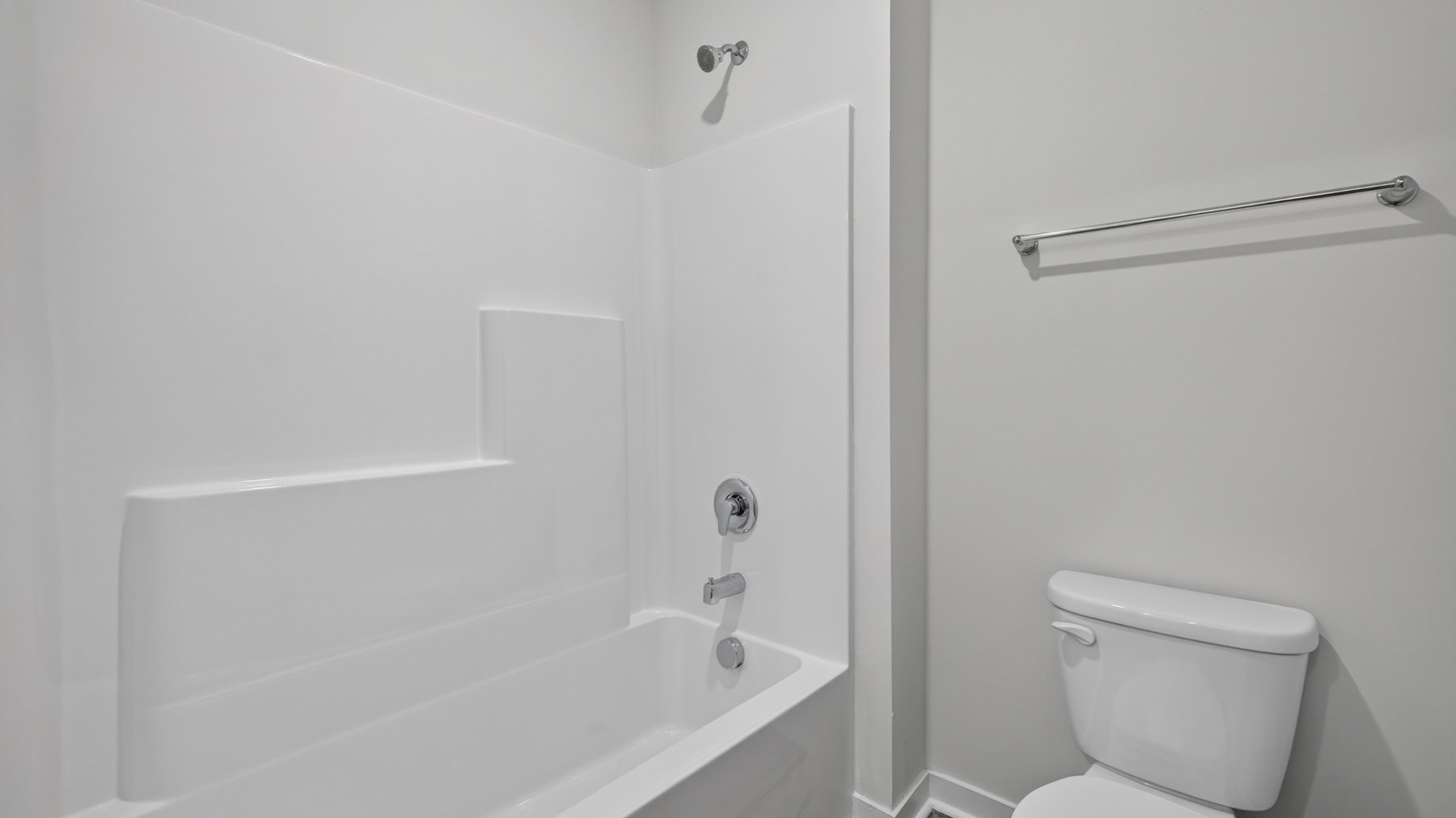 Bathroom with double sinks and tub shower