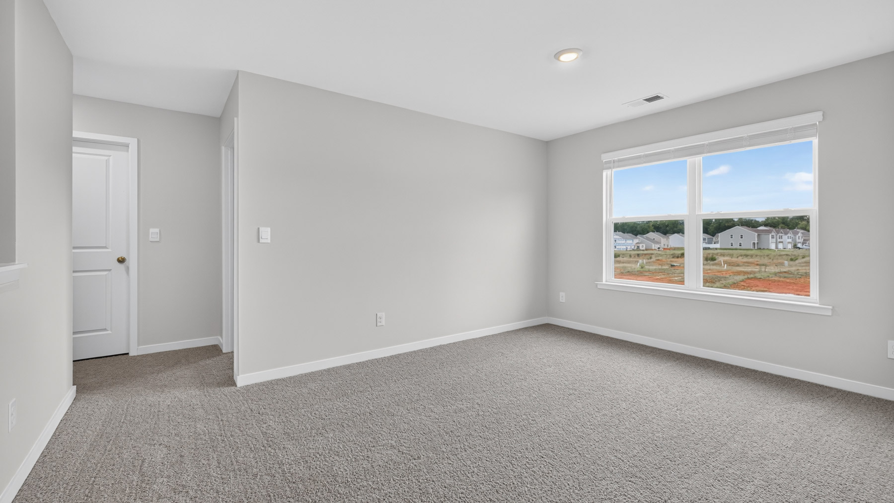Carpeted upstairs loft