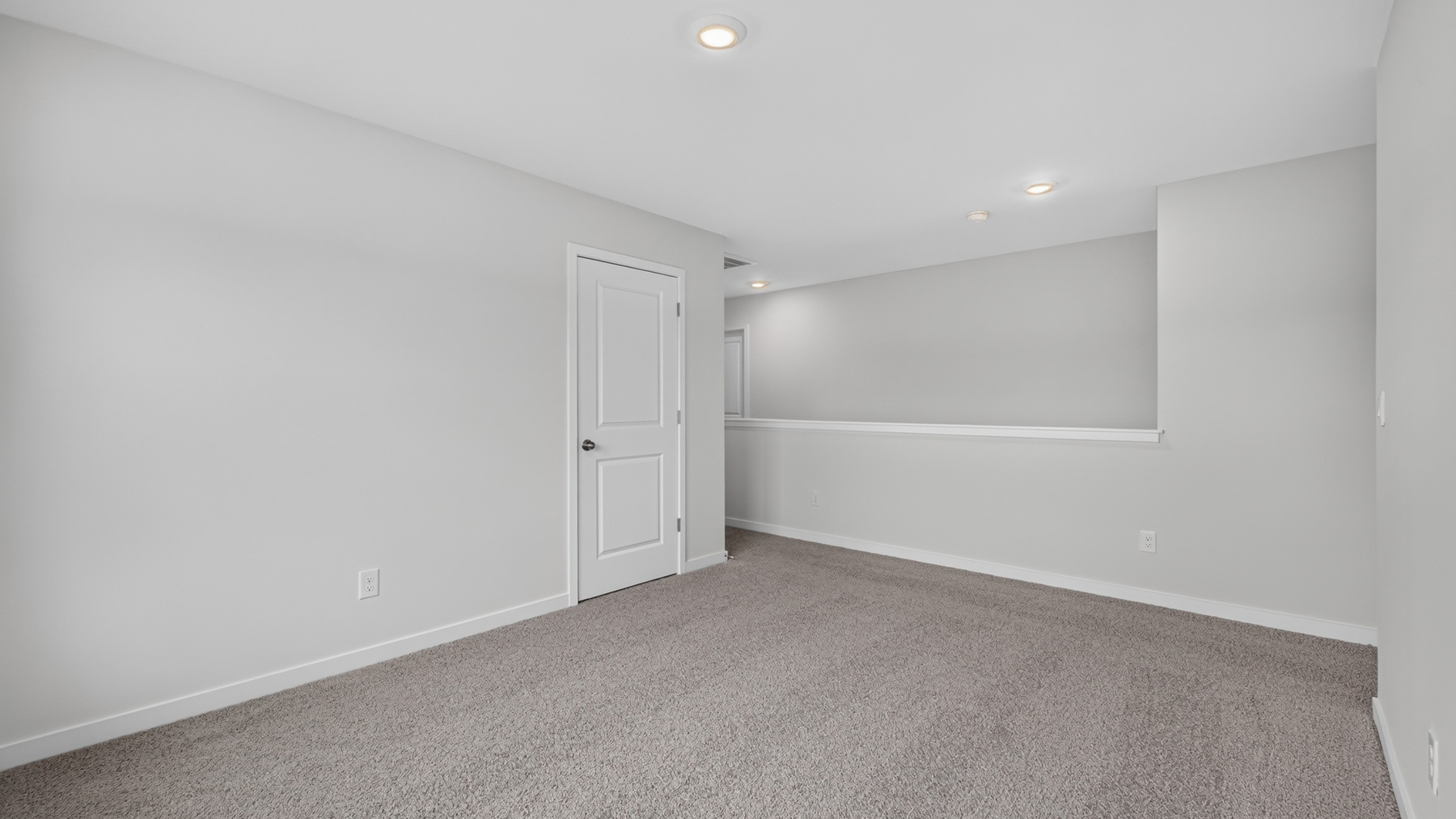 Carpeted upstairs loft