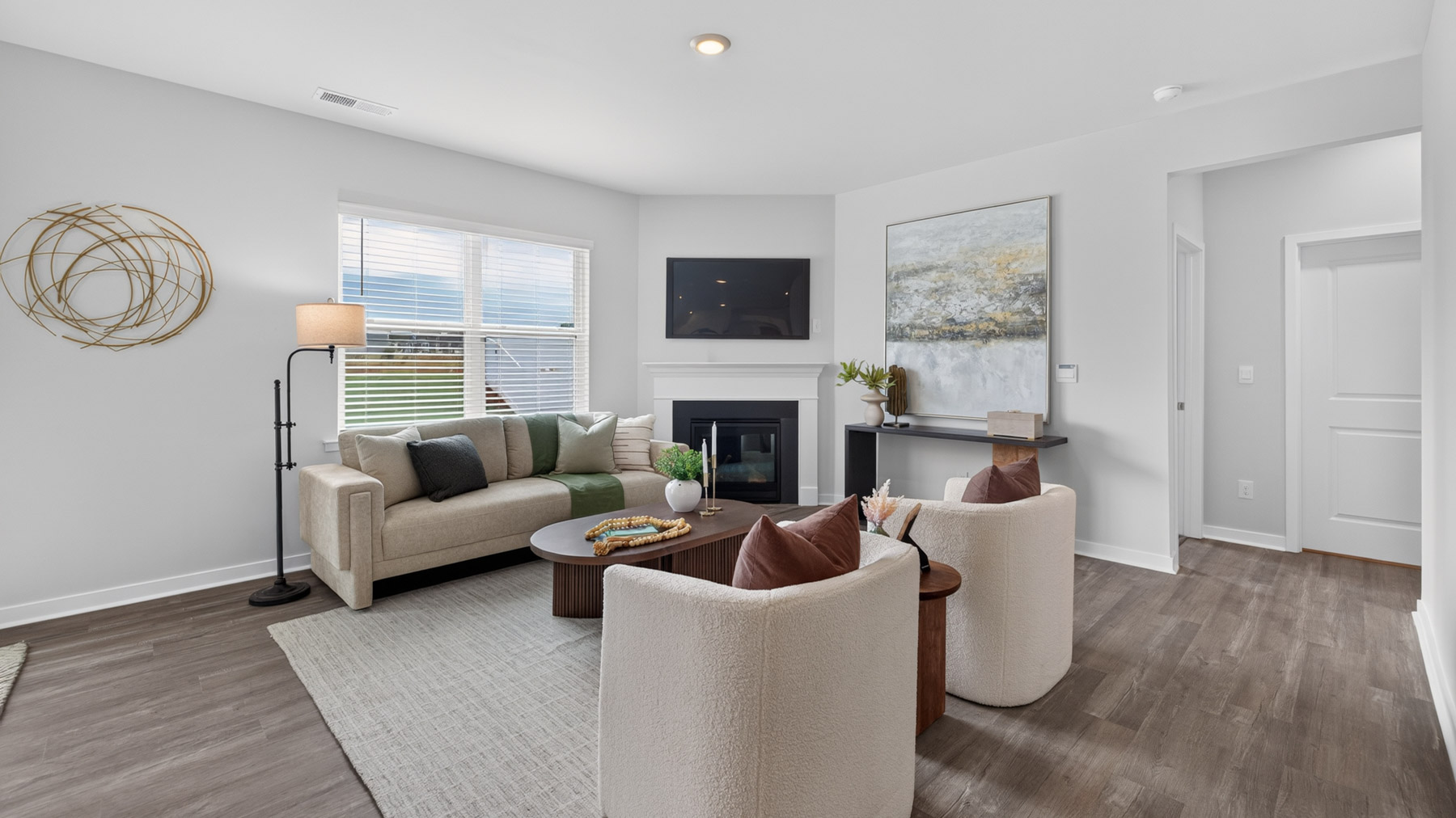 Living room with fireplace and windows