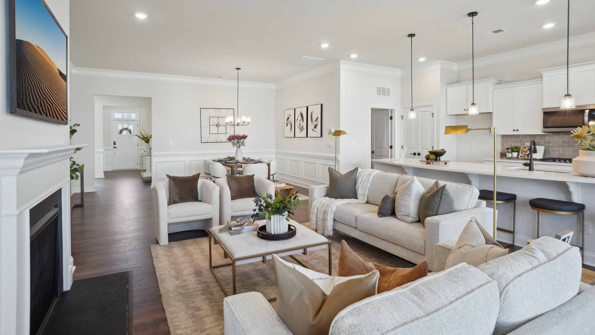 Dining area with wood floors and view of foyer
