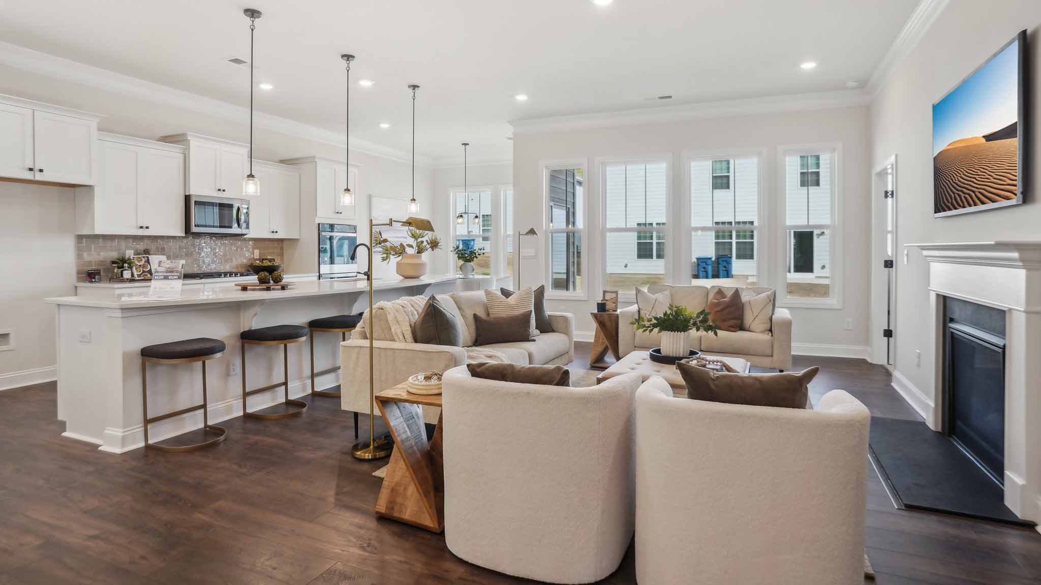 Dining area with wood floors and view of foyer